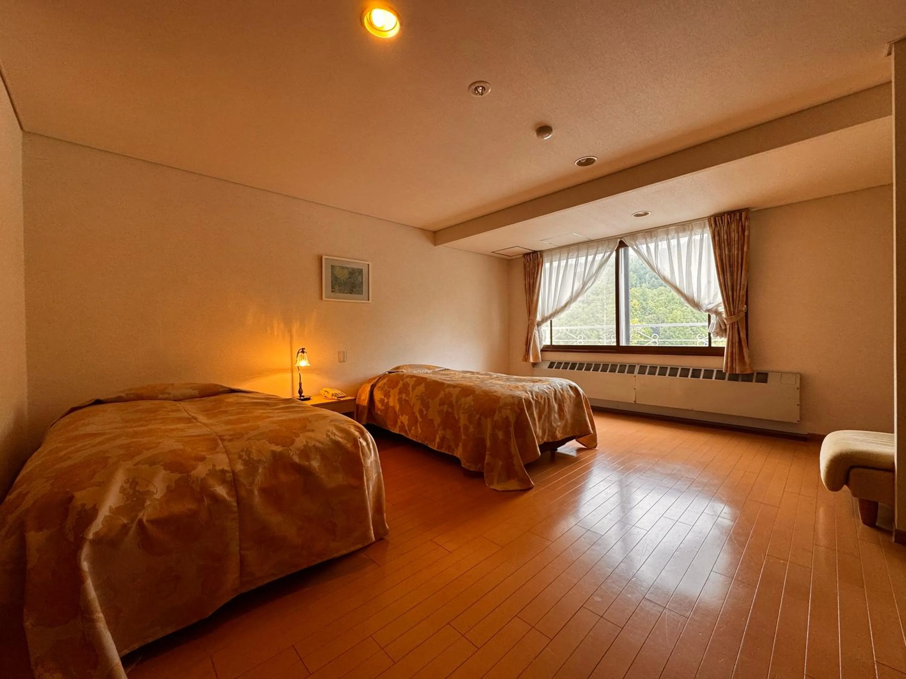 Bed in Kidoike Onsen Hotel