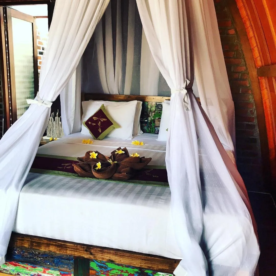 Bed in Balangan Sea View Bungalow