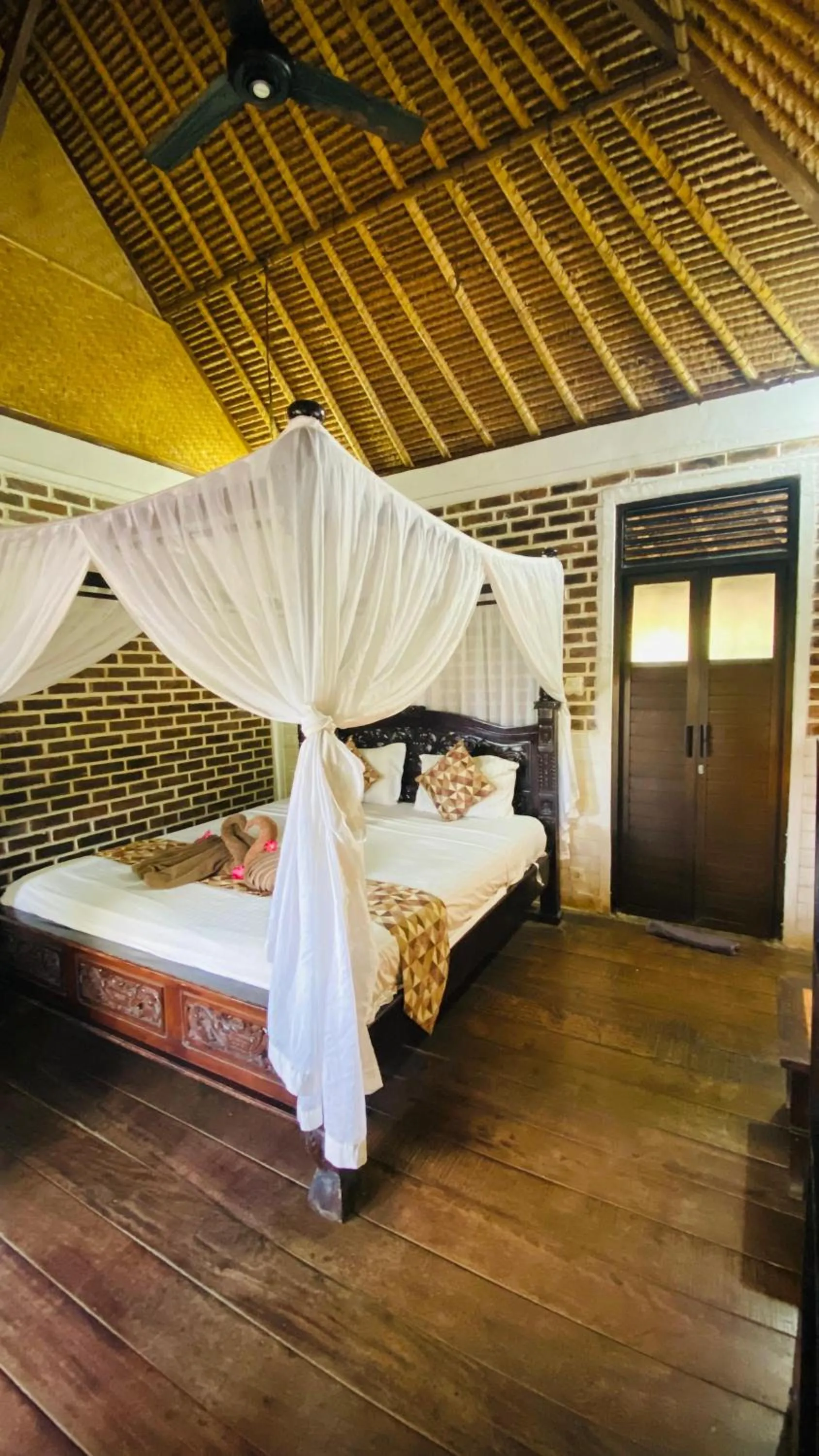 Bed in Balangan Sea View Bungalow