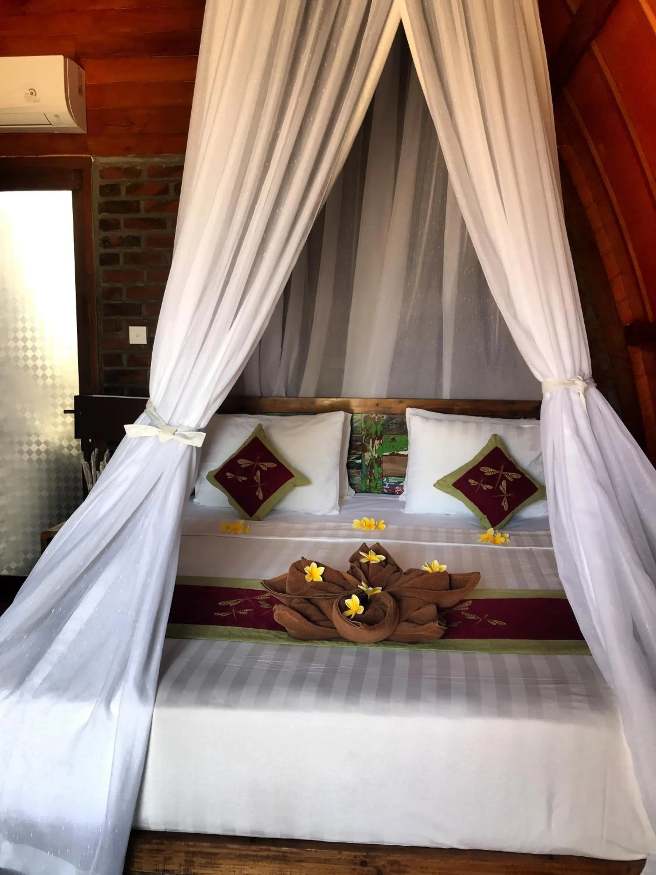 Bed in Balangan Sea View Bungalow