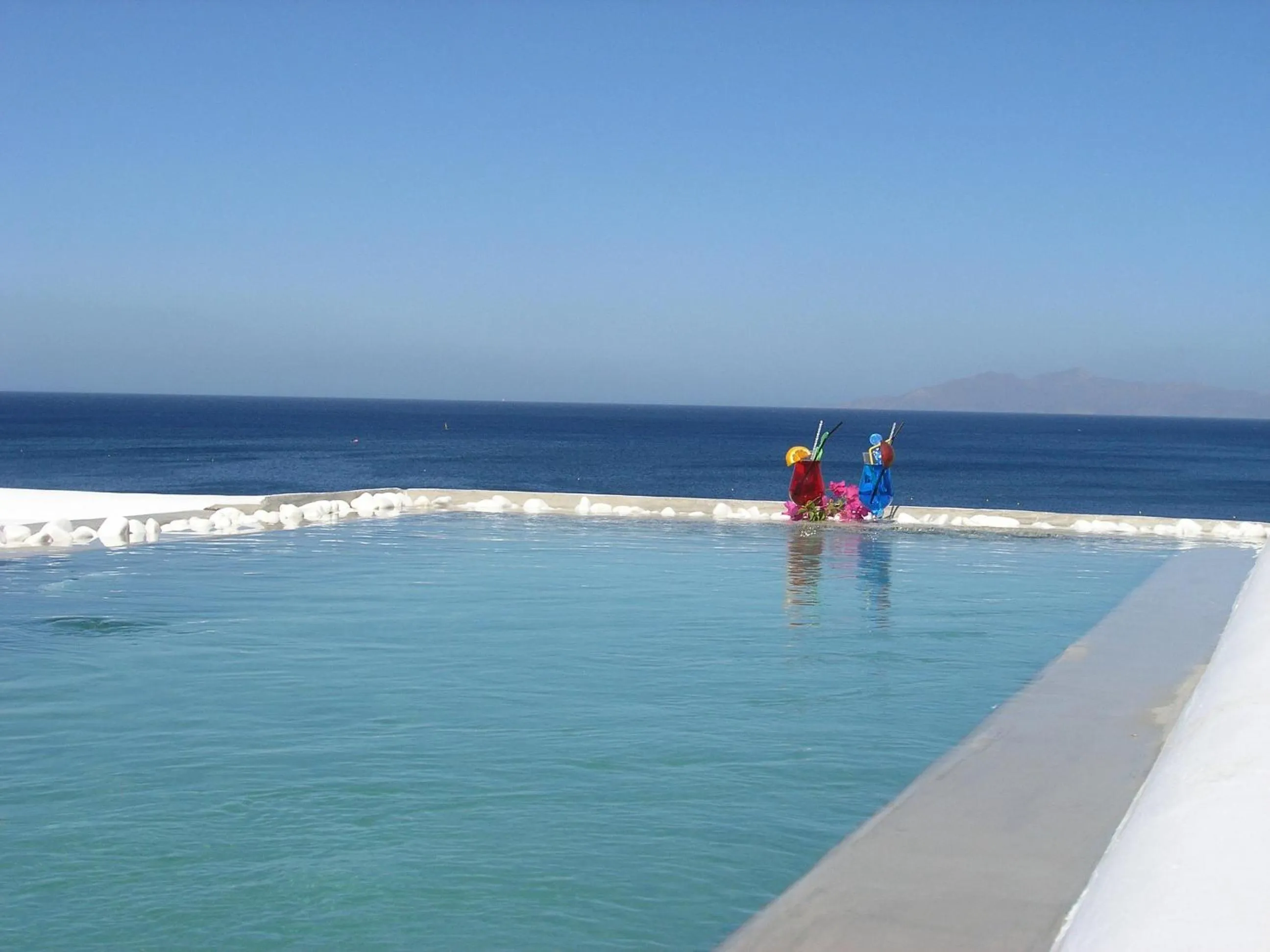 Swimming pool in Blue Waves Suites & Apartments