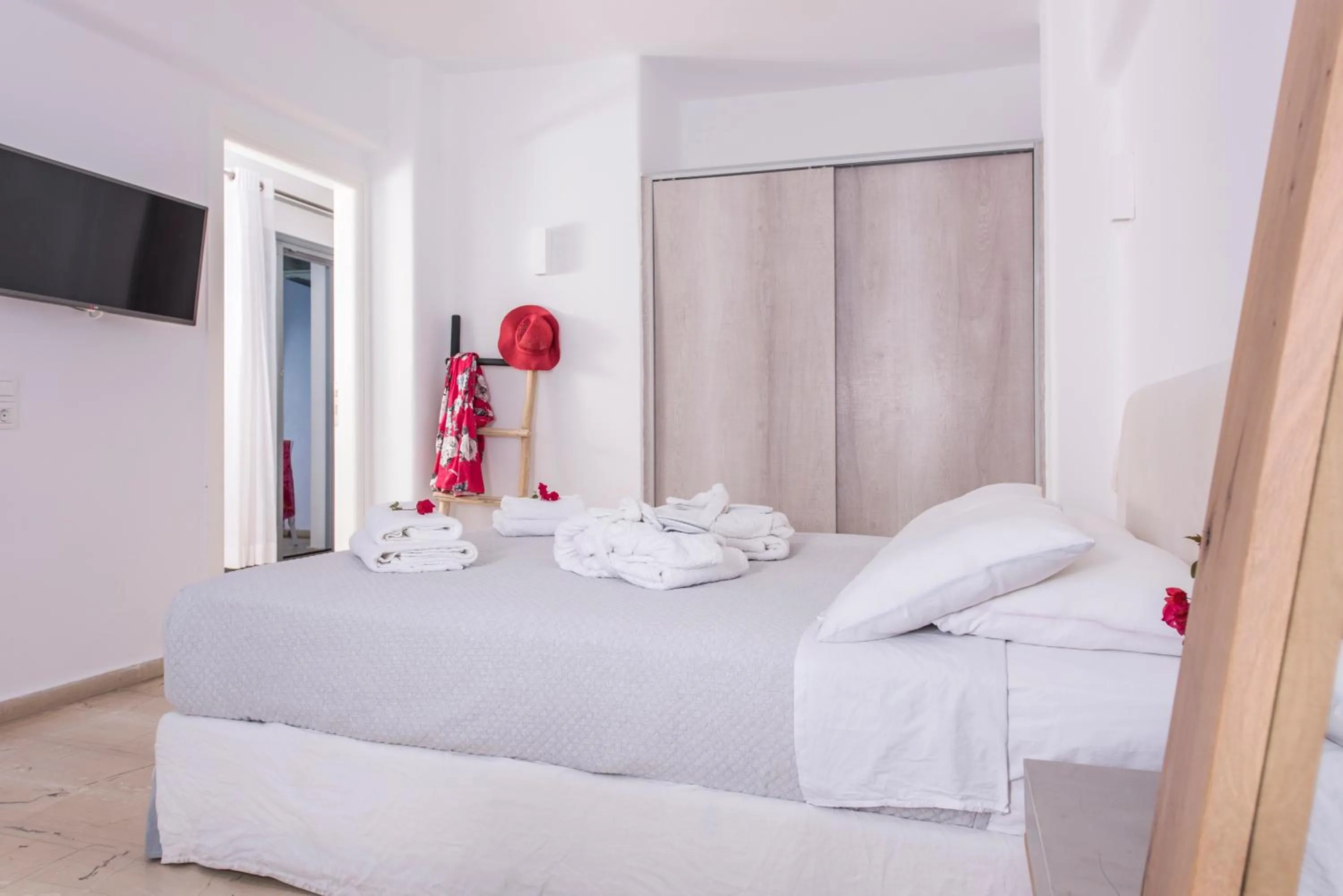 Bedroom, Bed in Blue Waves Suites & Apartments