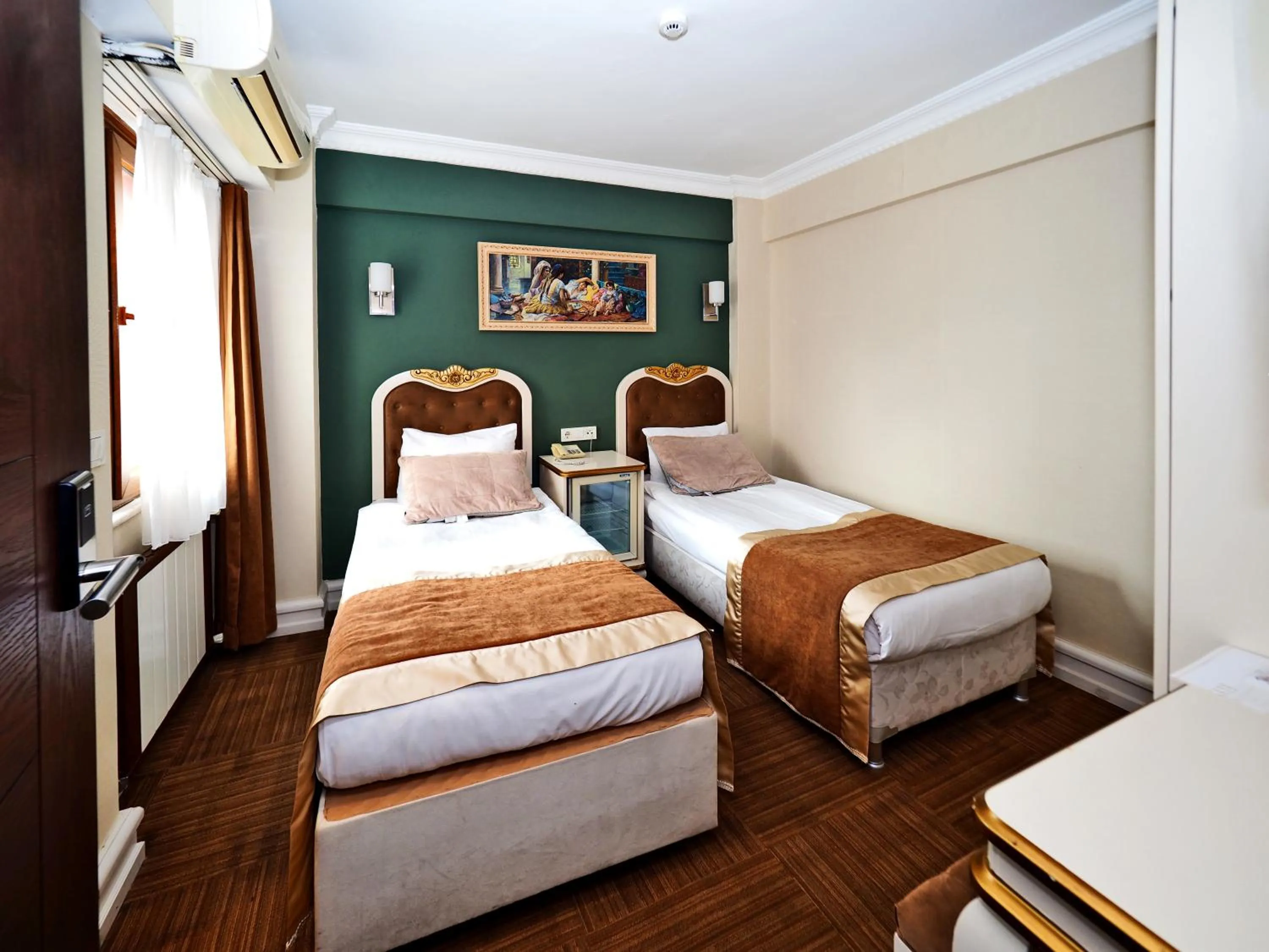 Bed in Elysion Hotel