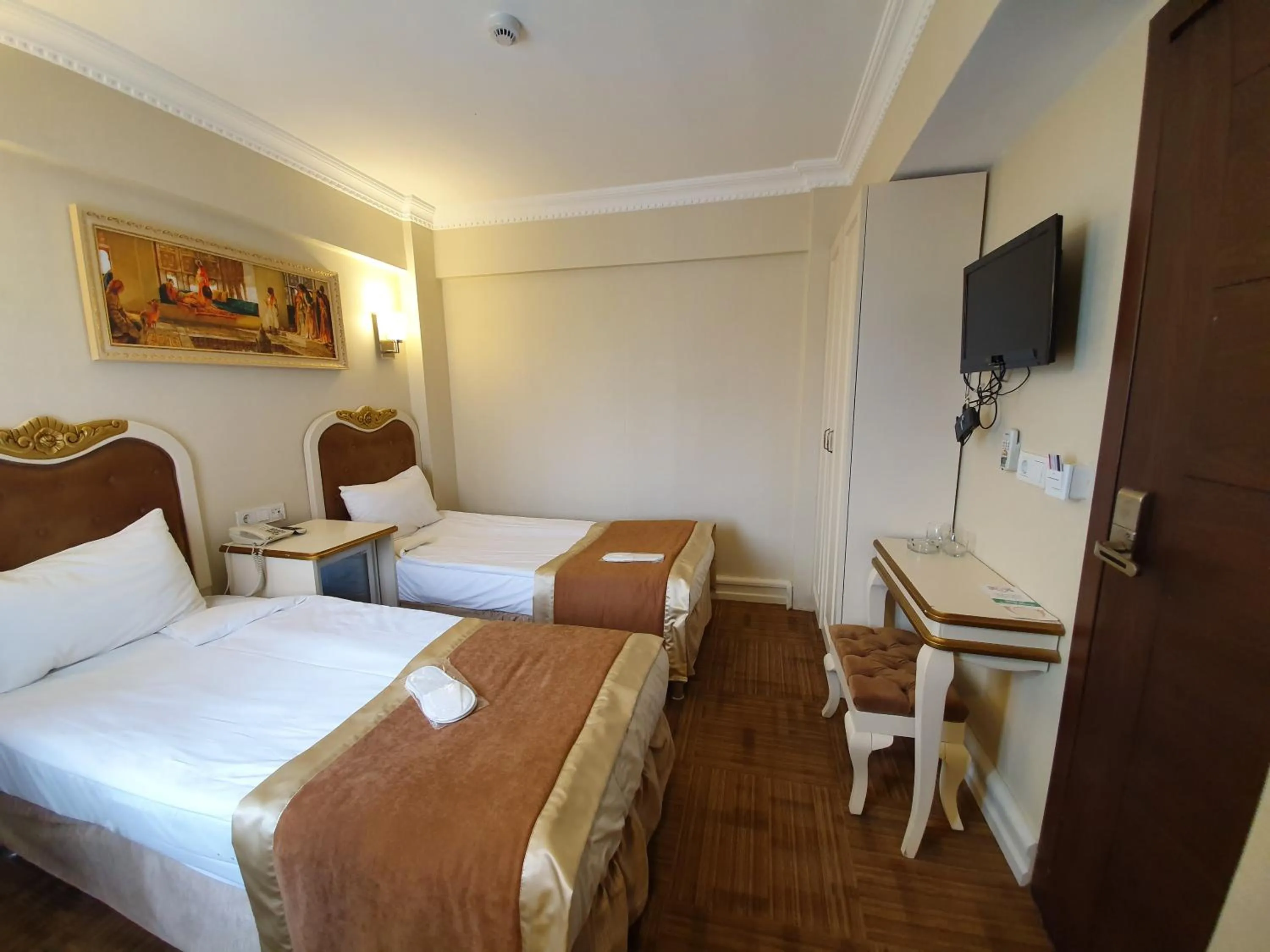 Bed in Elysion Hotel