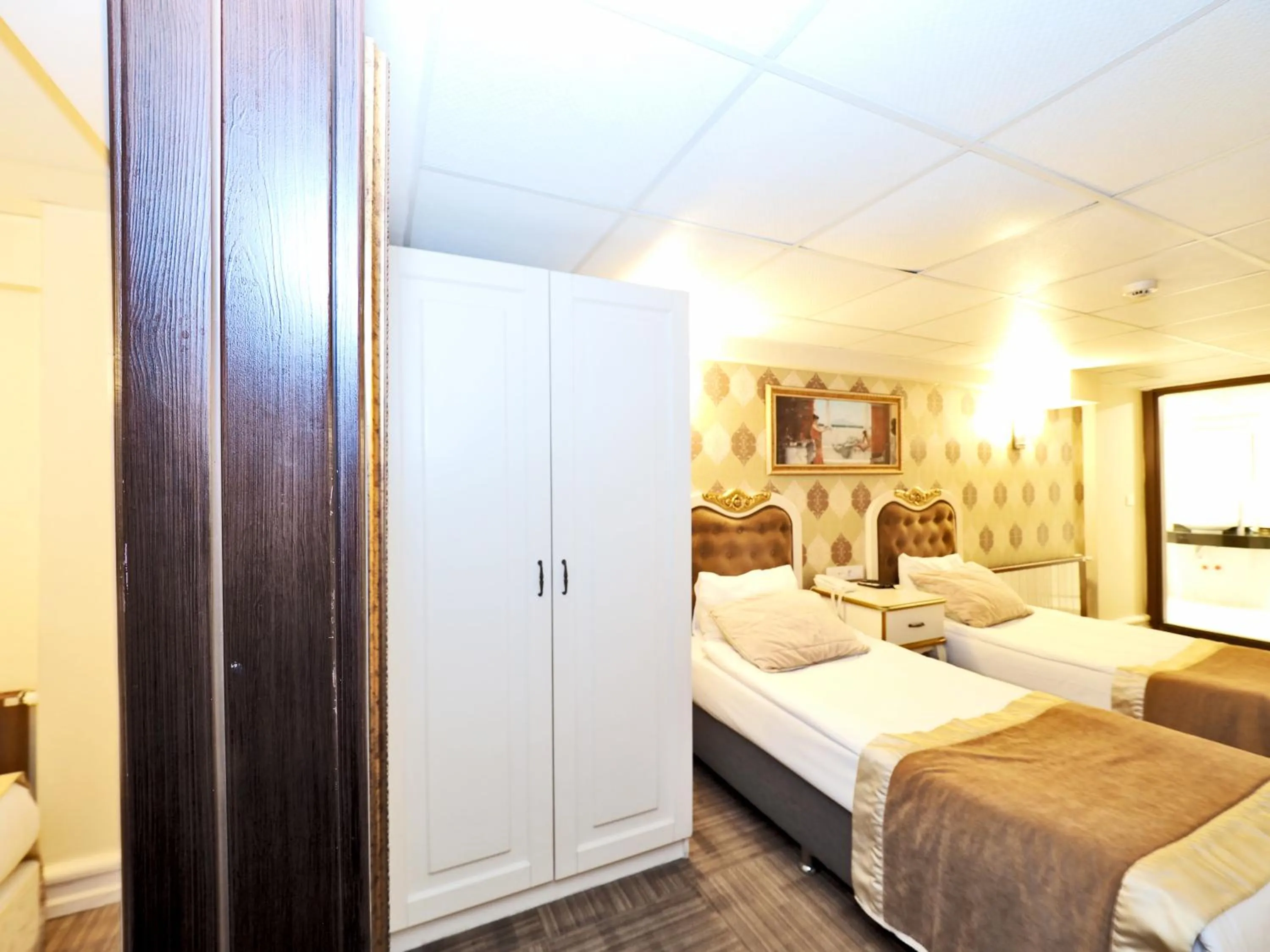 Bed in Elysion Hotel