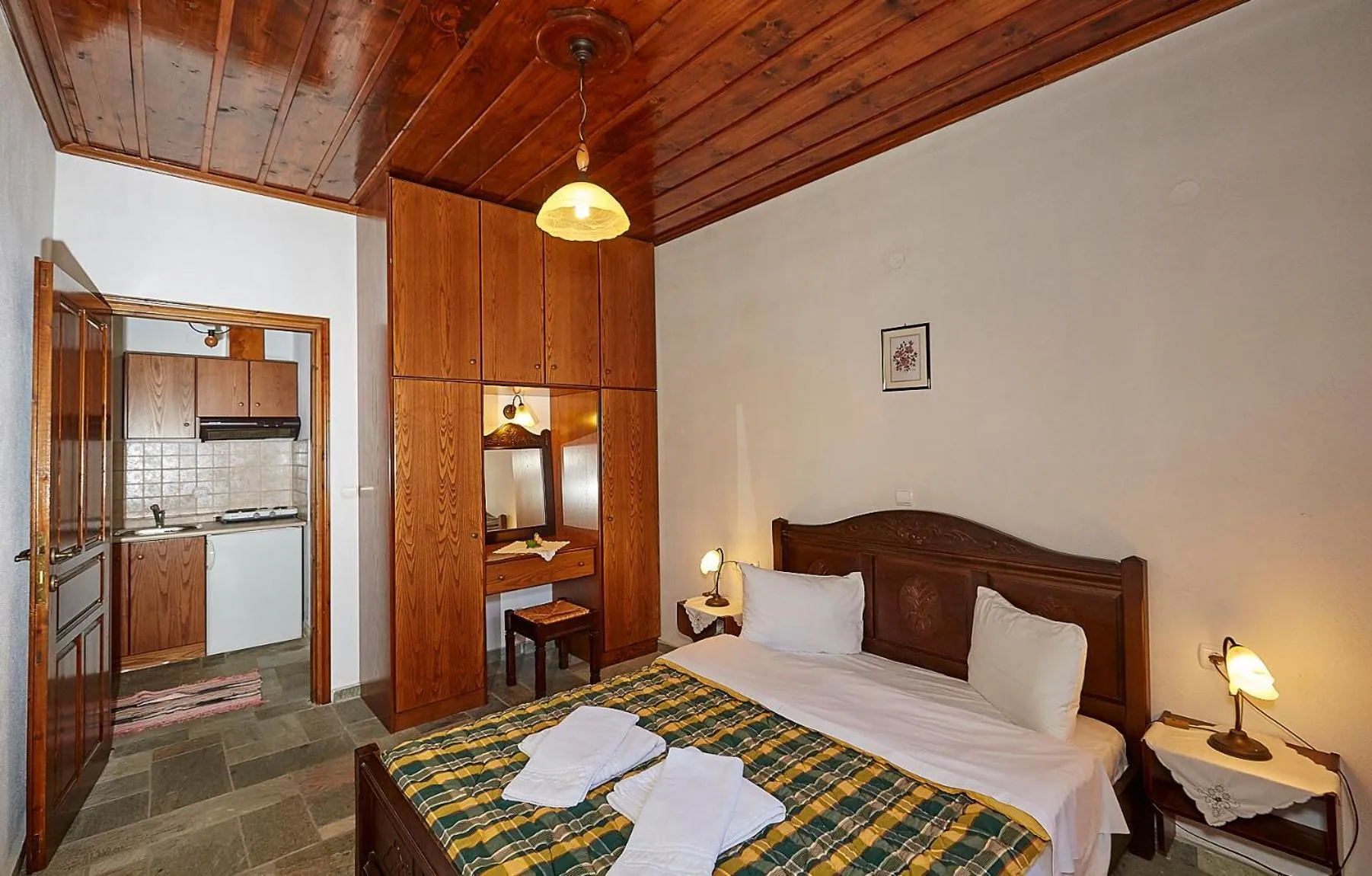 Kitchen or kitchenette, Bed in Hotel Atrapos