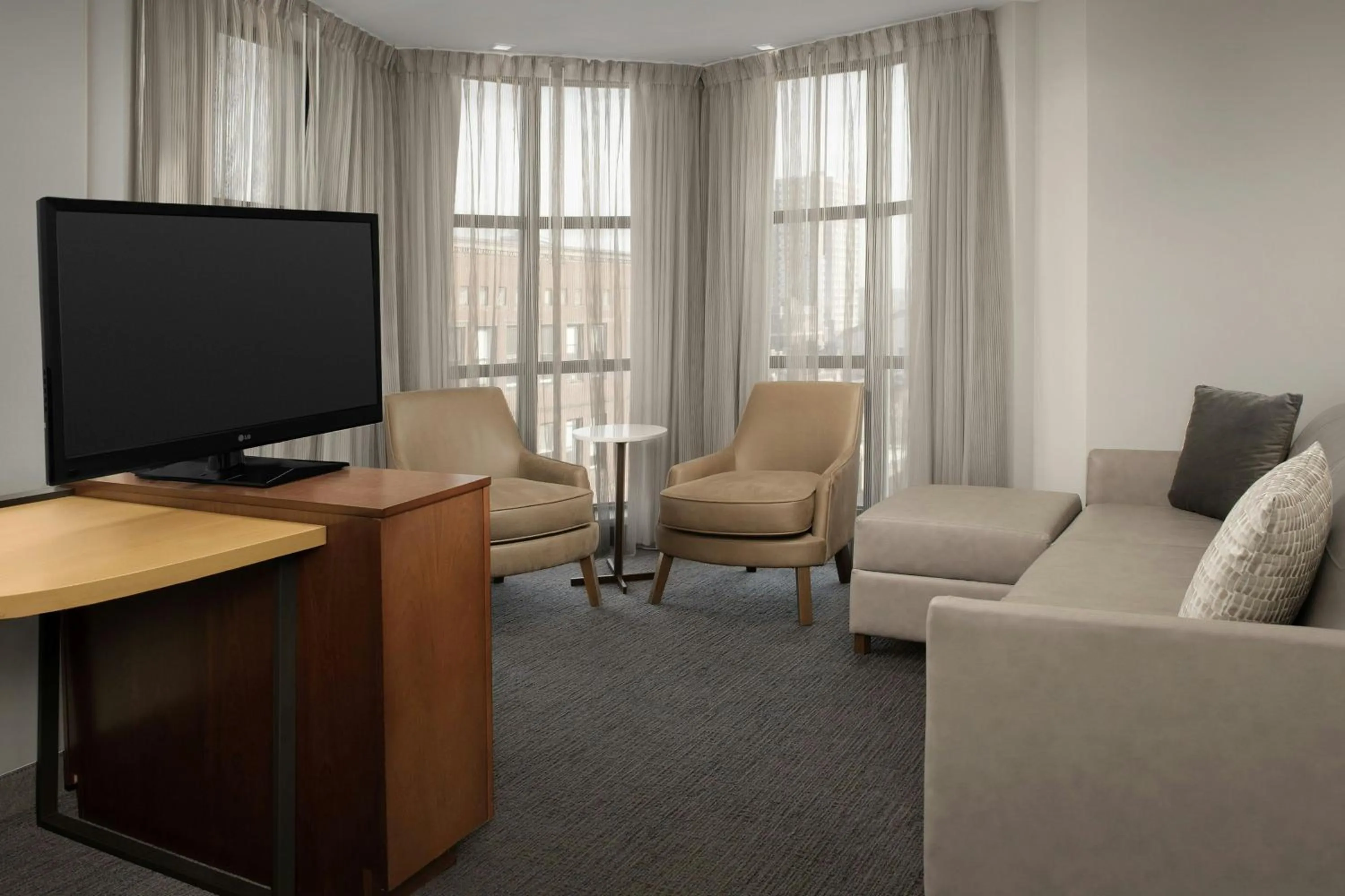 Living room in Residence Inn Syracuse Downtown at Armory Square