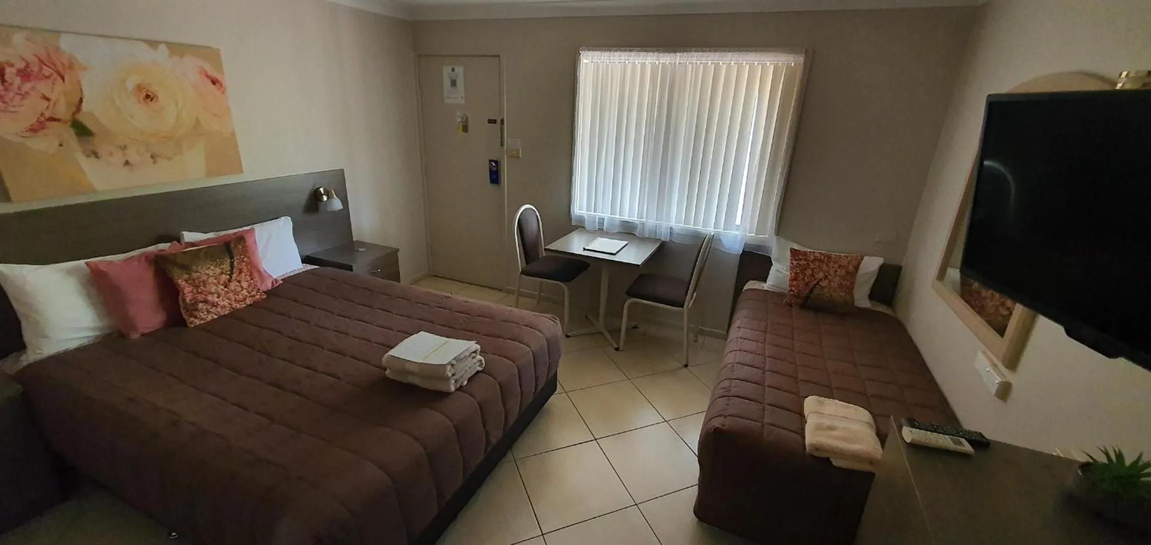 Bed in Central Motel Nelson Bay