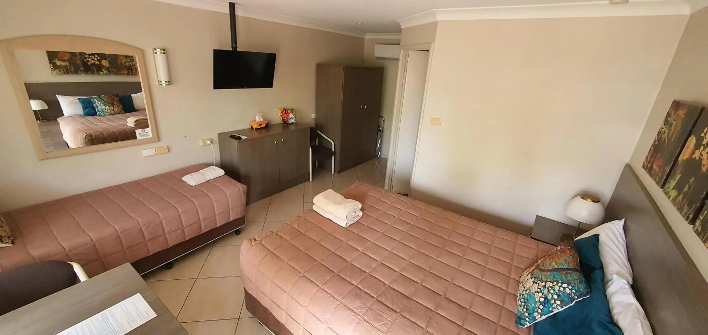 Bed in Central Motel Nelson Bay