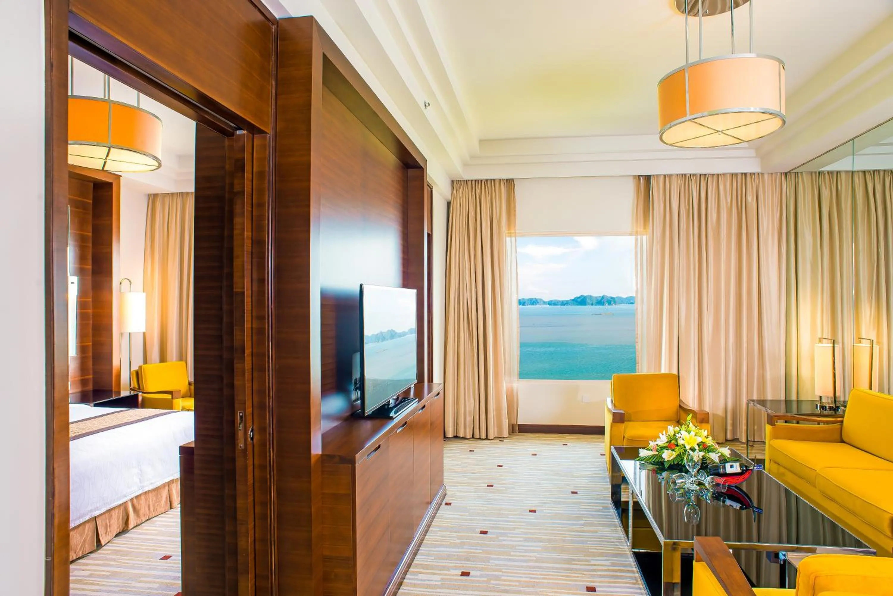 Living room, Bed in Royal Halong Hotel