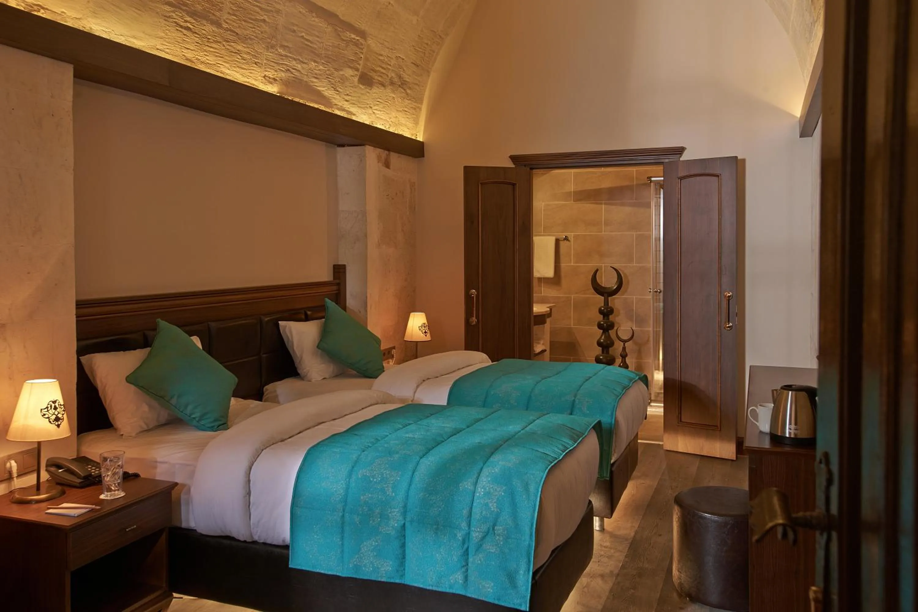 Bed in Sirehan Hotel