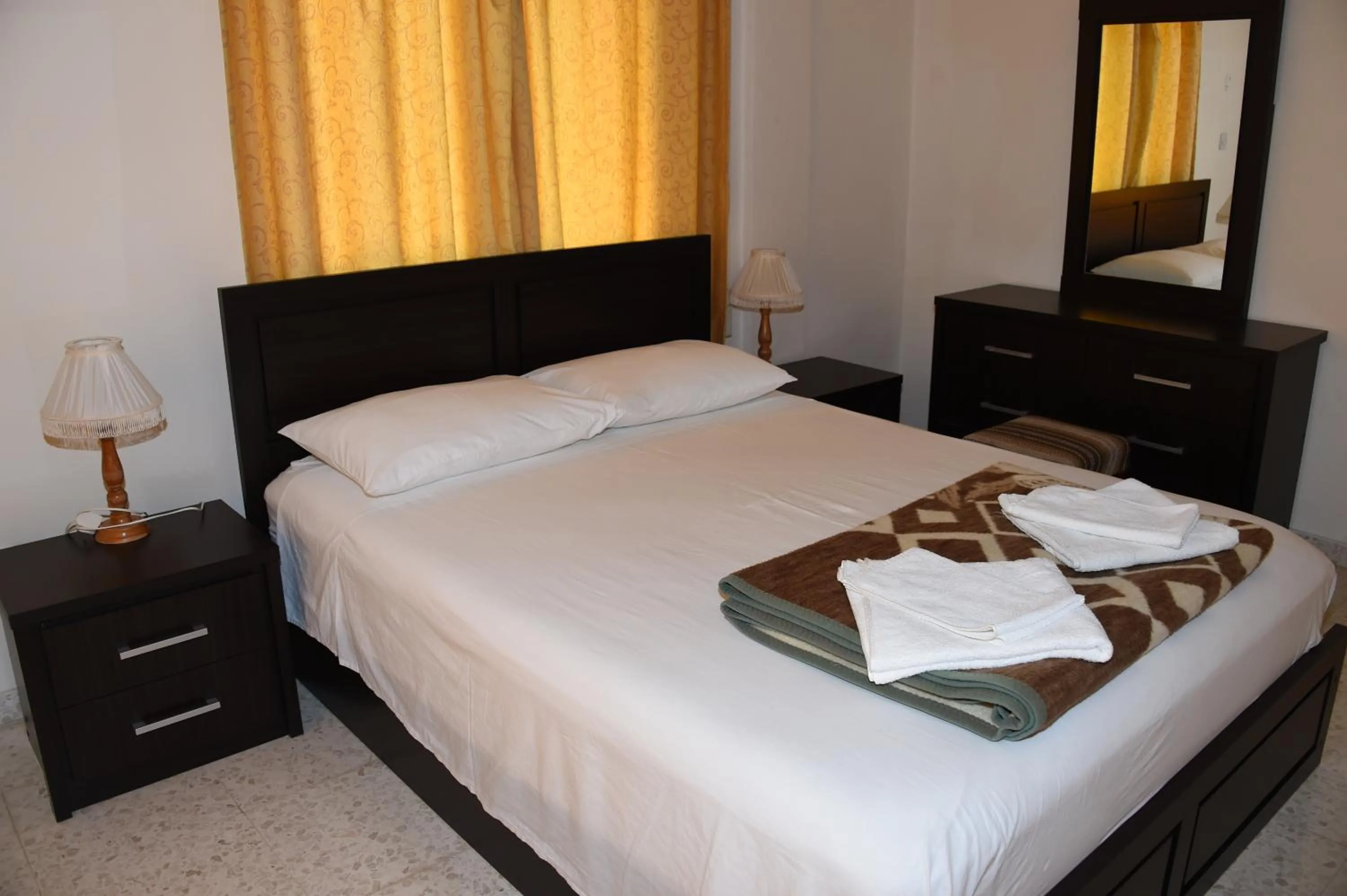 Bedroom in Odysseas & Eleni Hotel Apartments