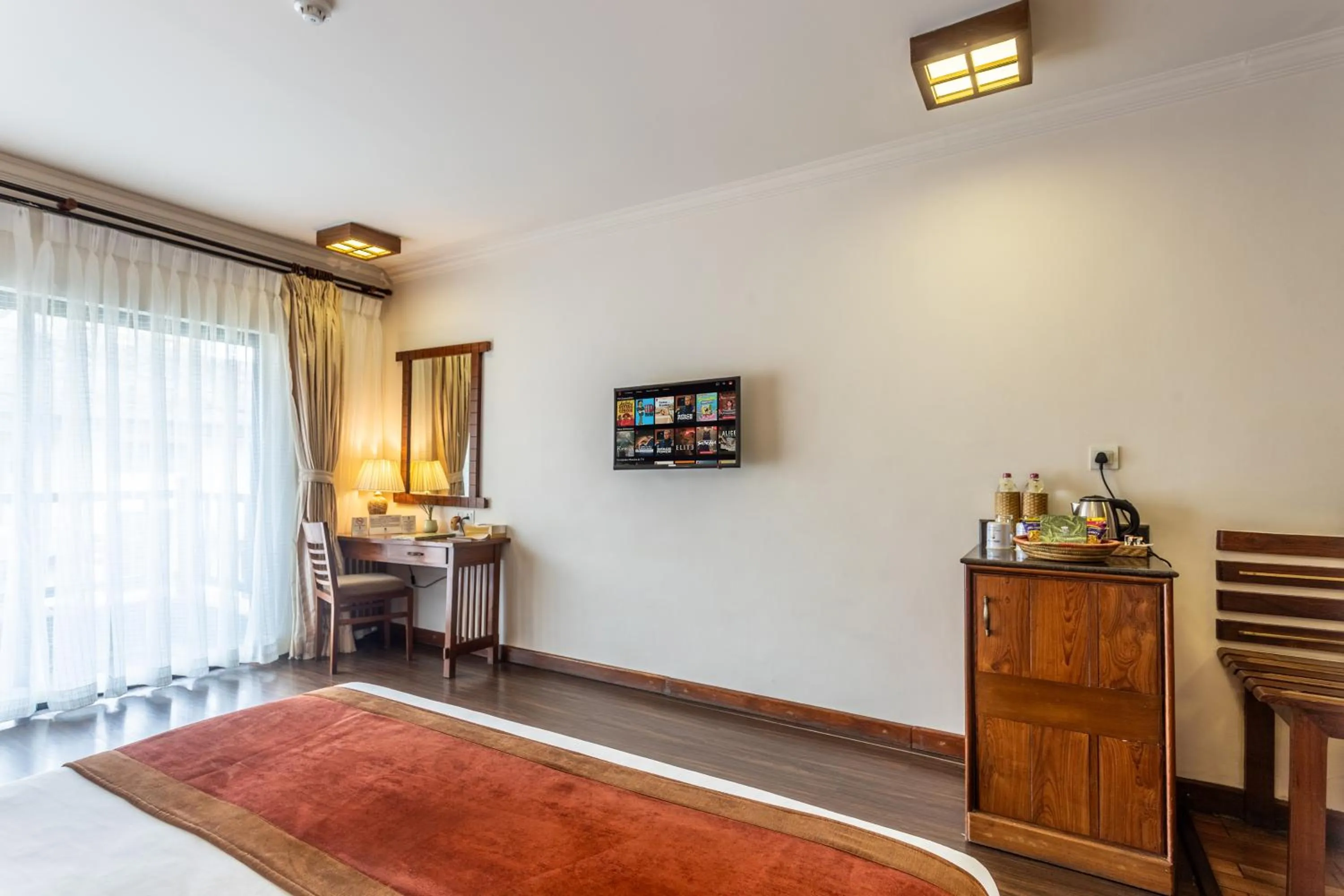 Bed in Atithi Resort & Spa