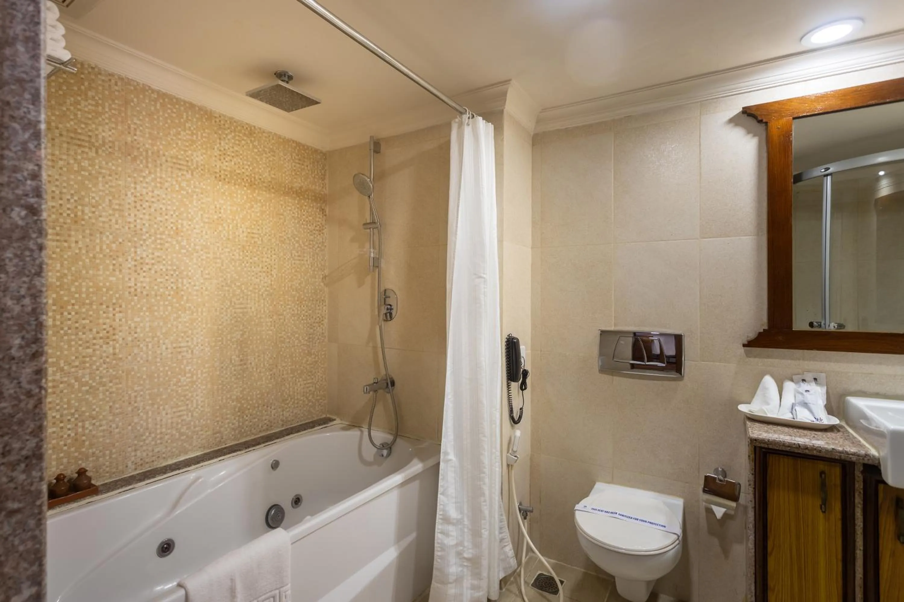 Bathroom in Atithi Resort & Spa