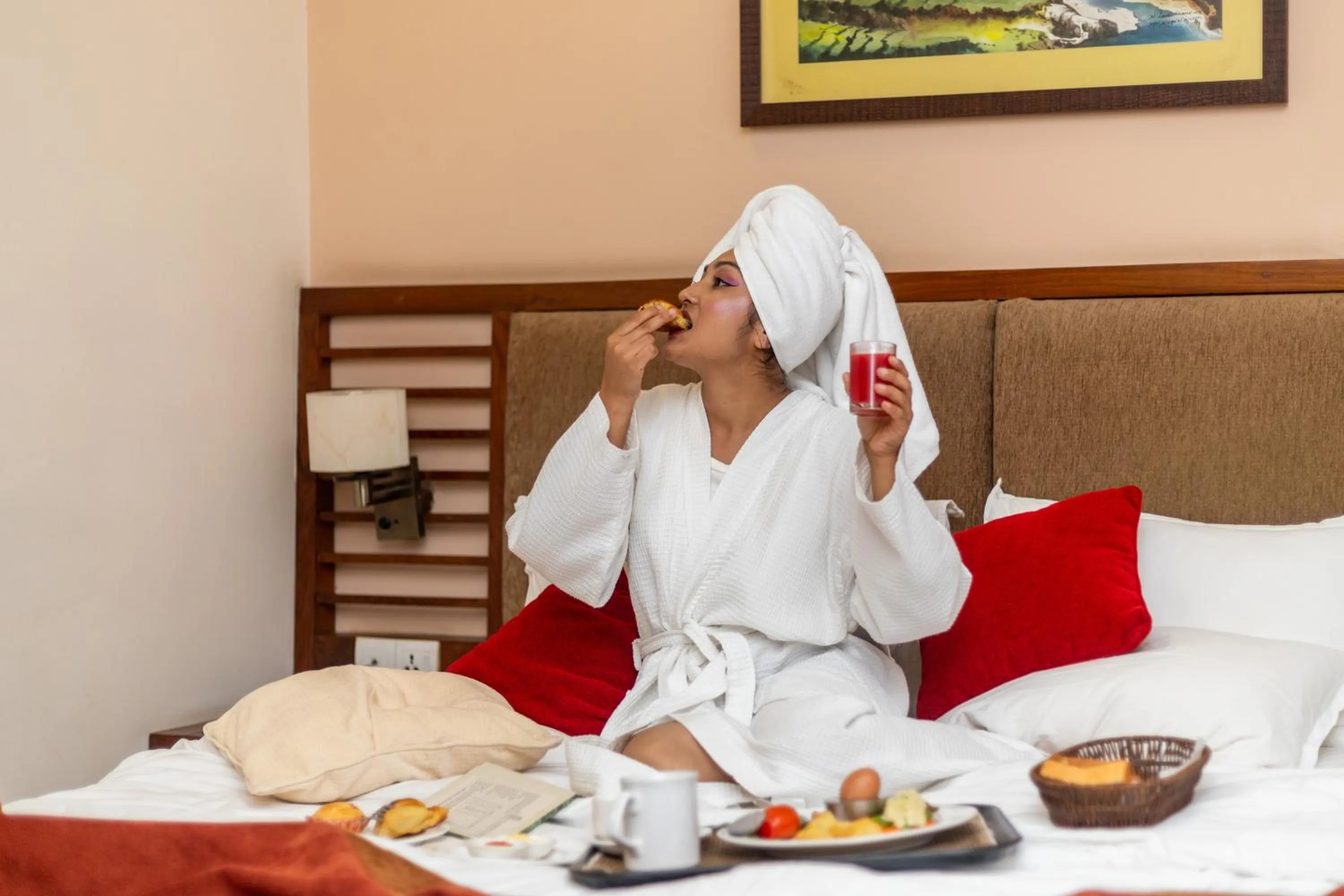 Bed in Atithi Resort & Spa