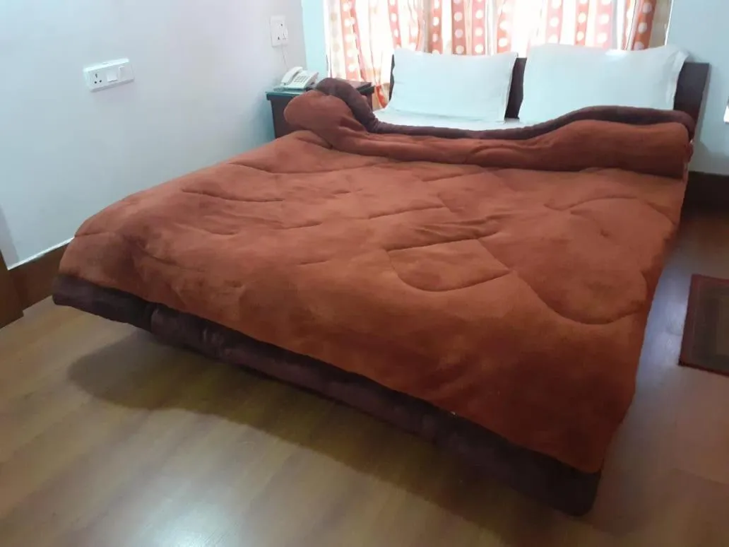 Bed in Dragon I Resorts