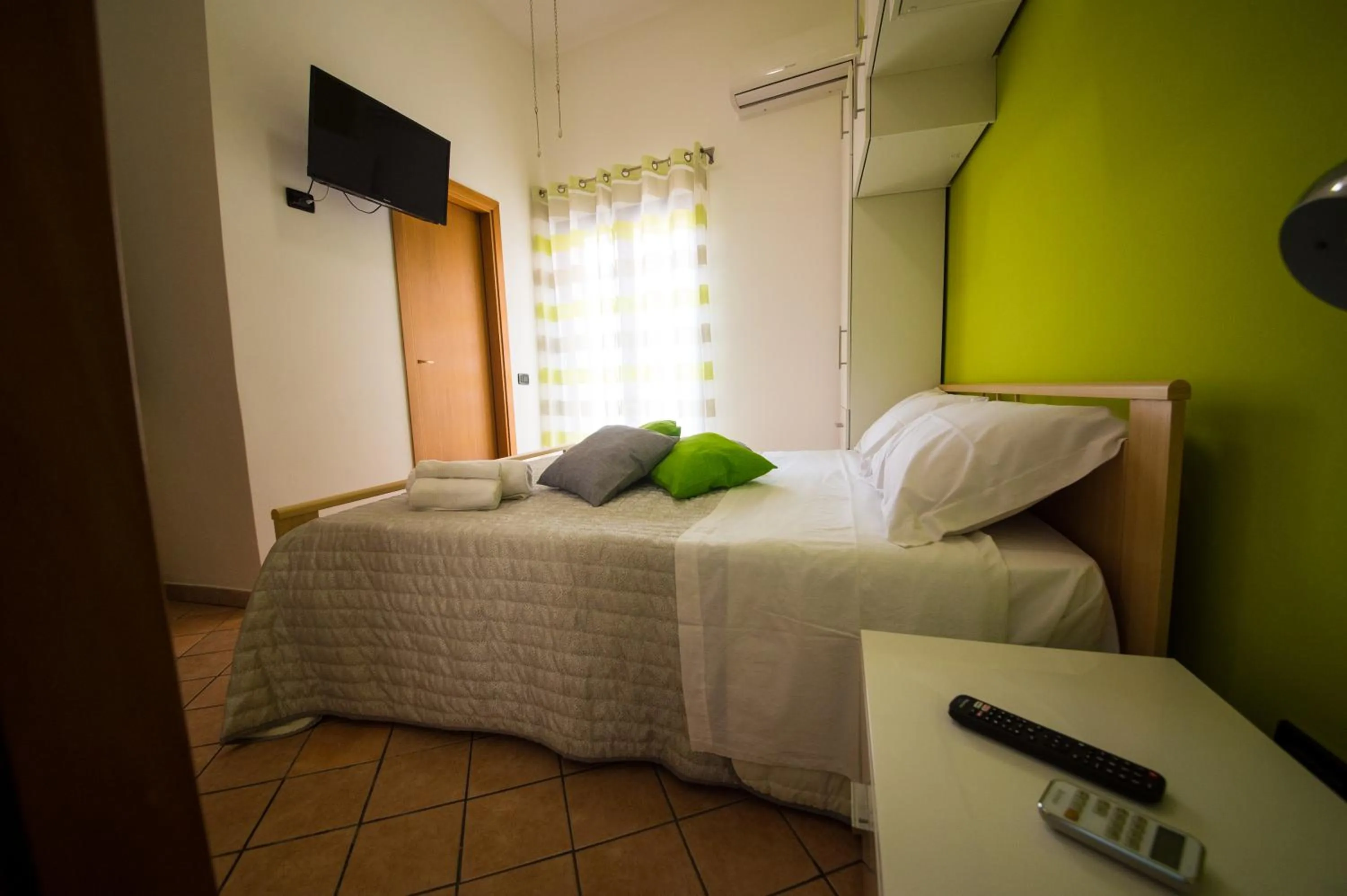 Bed in 'A Cumerdia - Casa Vacanze