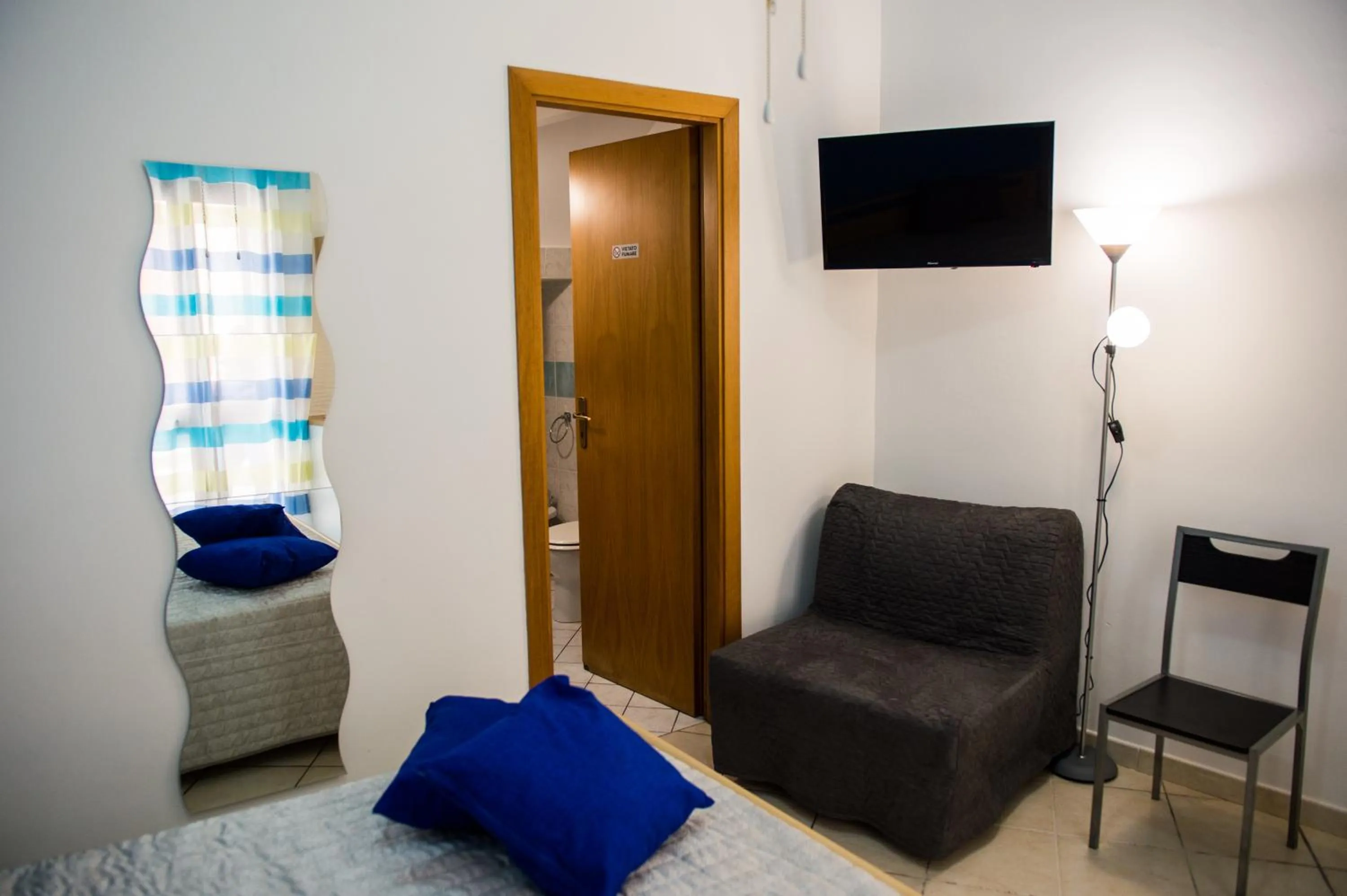 Bed in 'A Cumerdia - Casa Vacanze