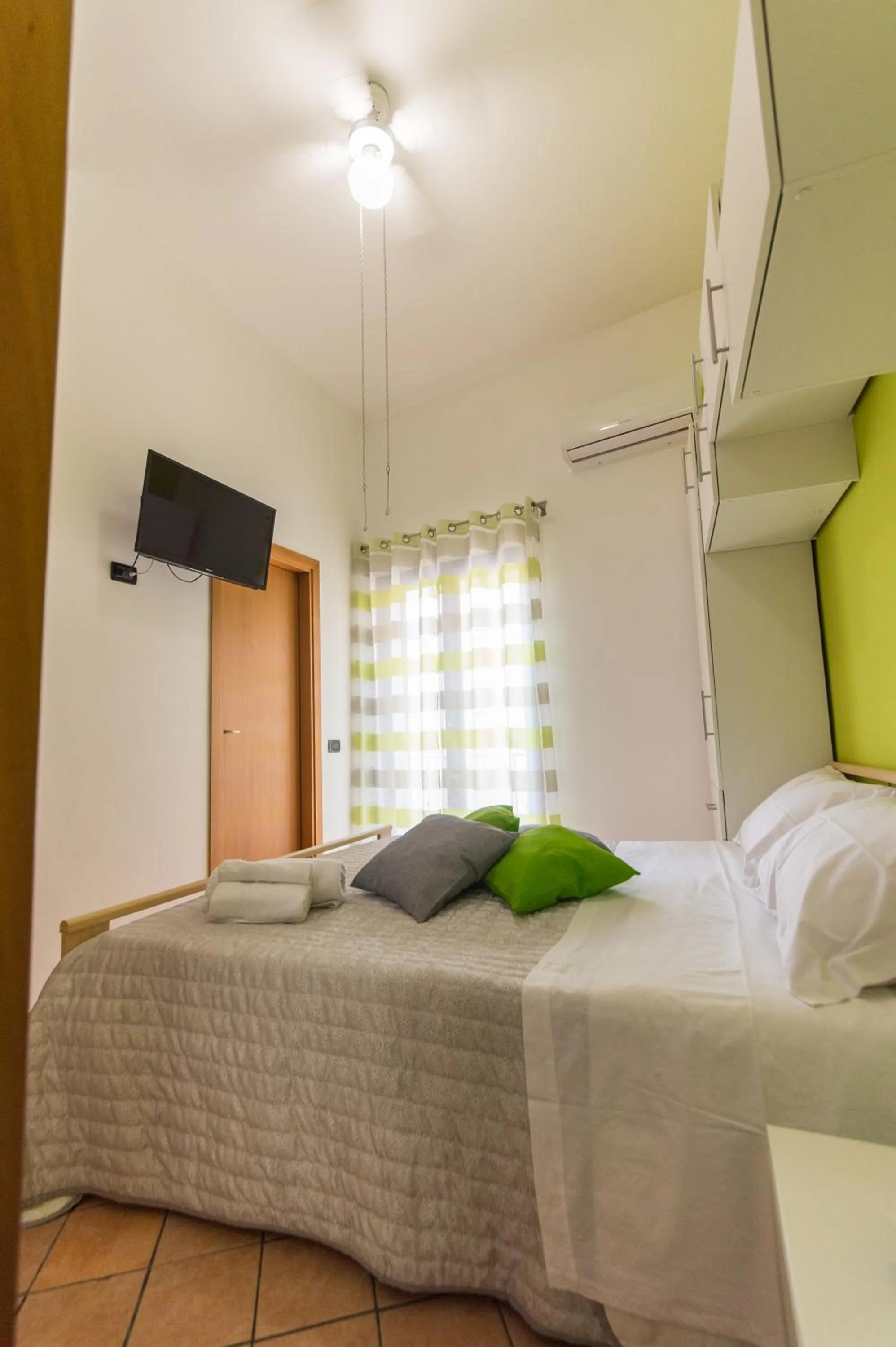 Bed in 'A Cumerdia - Casa Vacanze