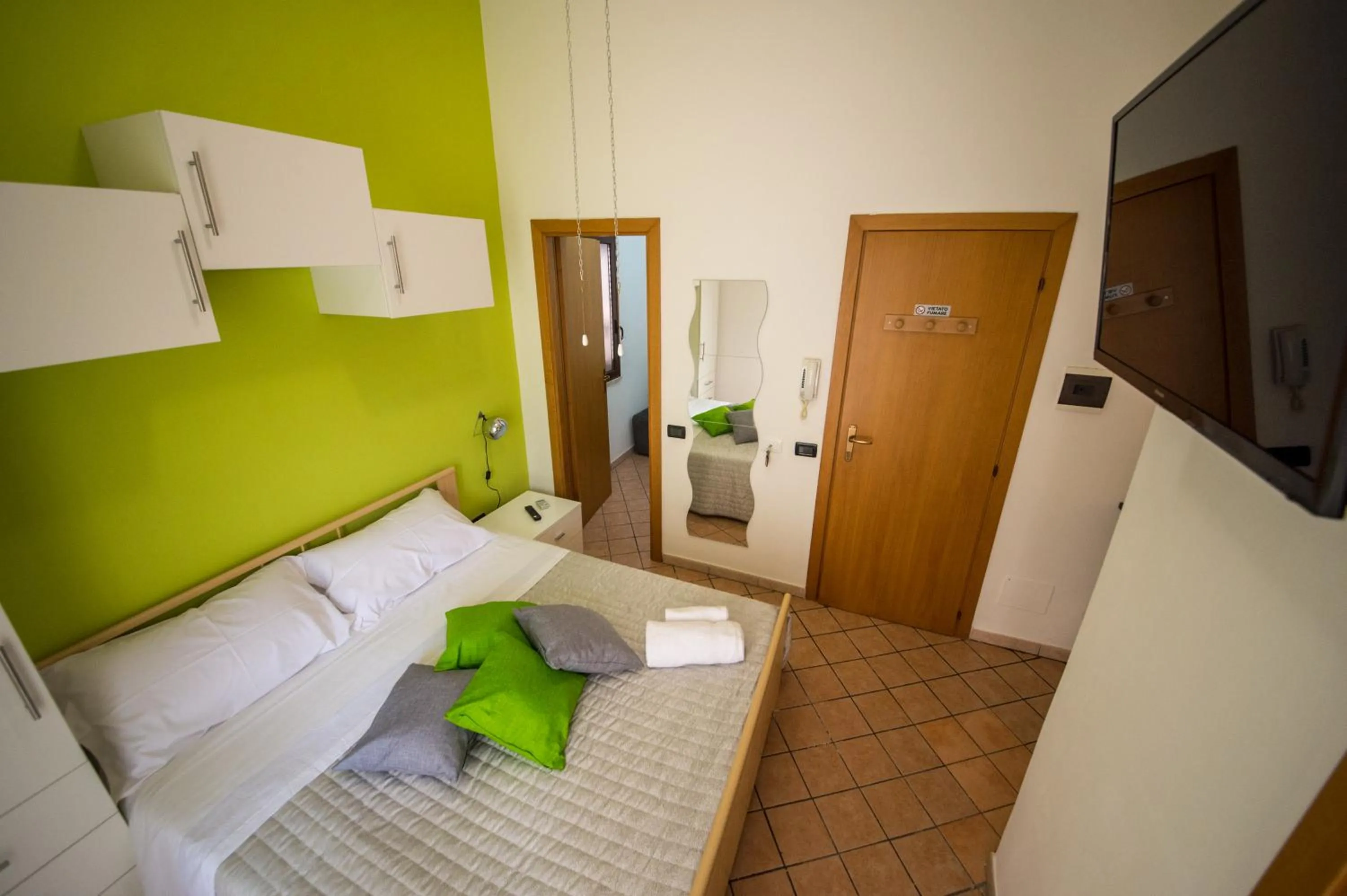 Bed in 'A Cumerdia - Casa Vacanze