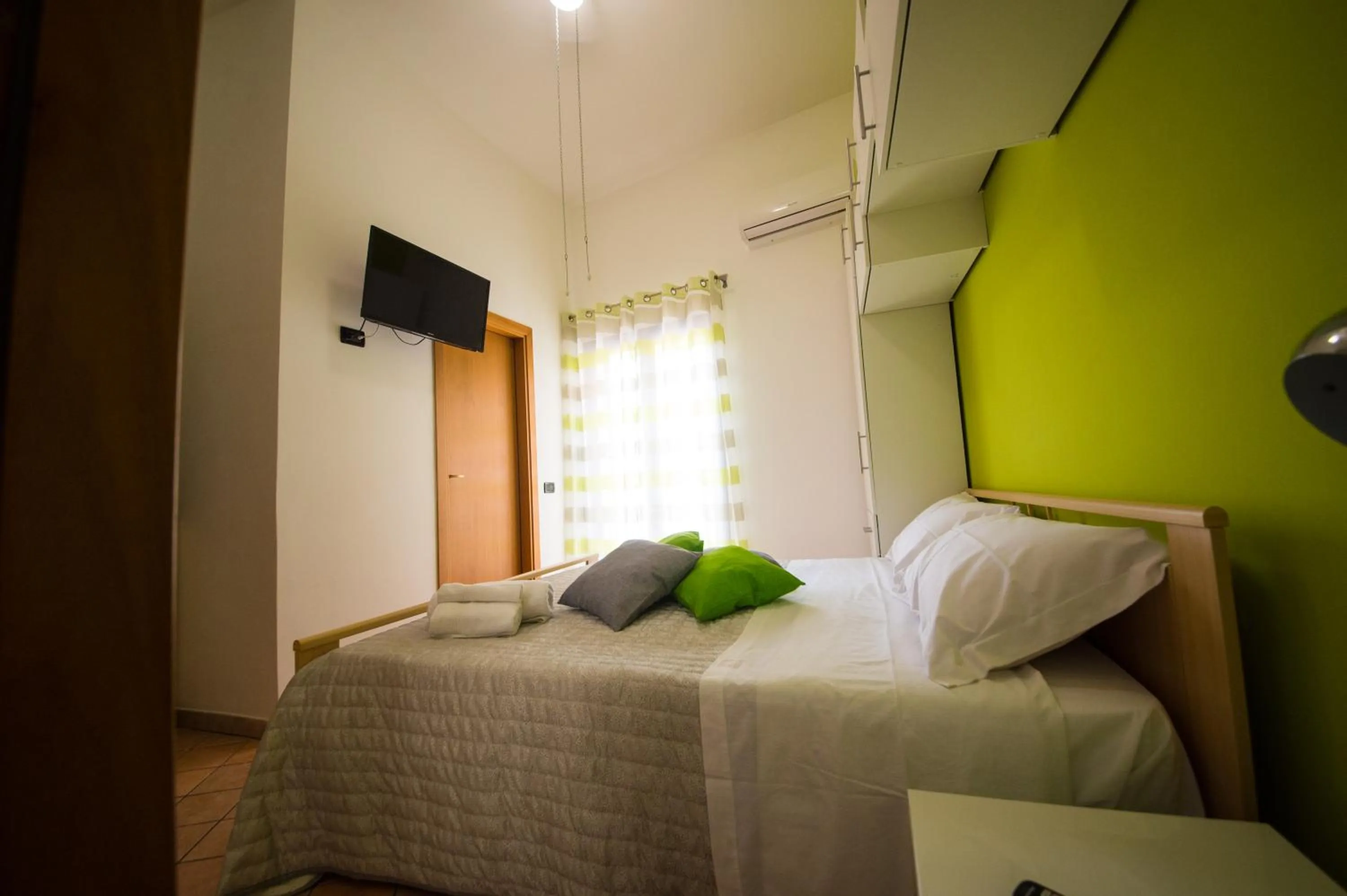 Bed in 'A Cumerdia - Casa Vacanze