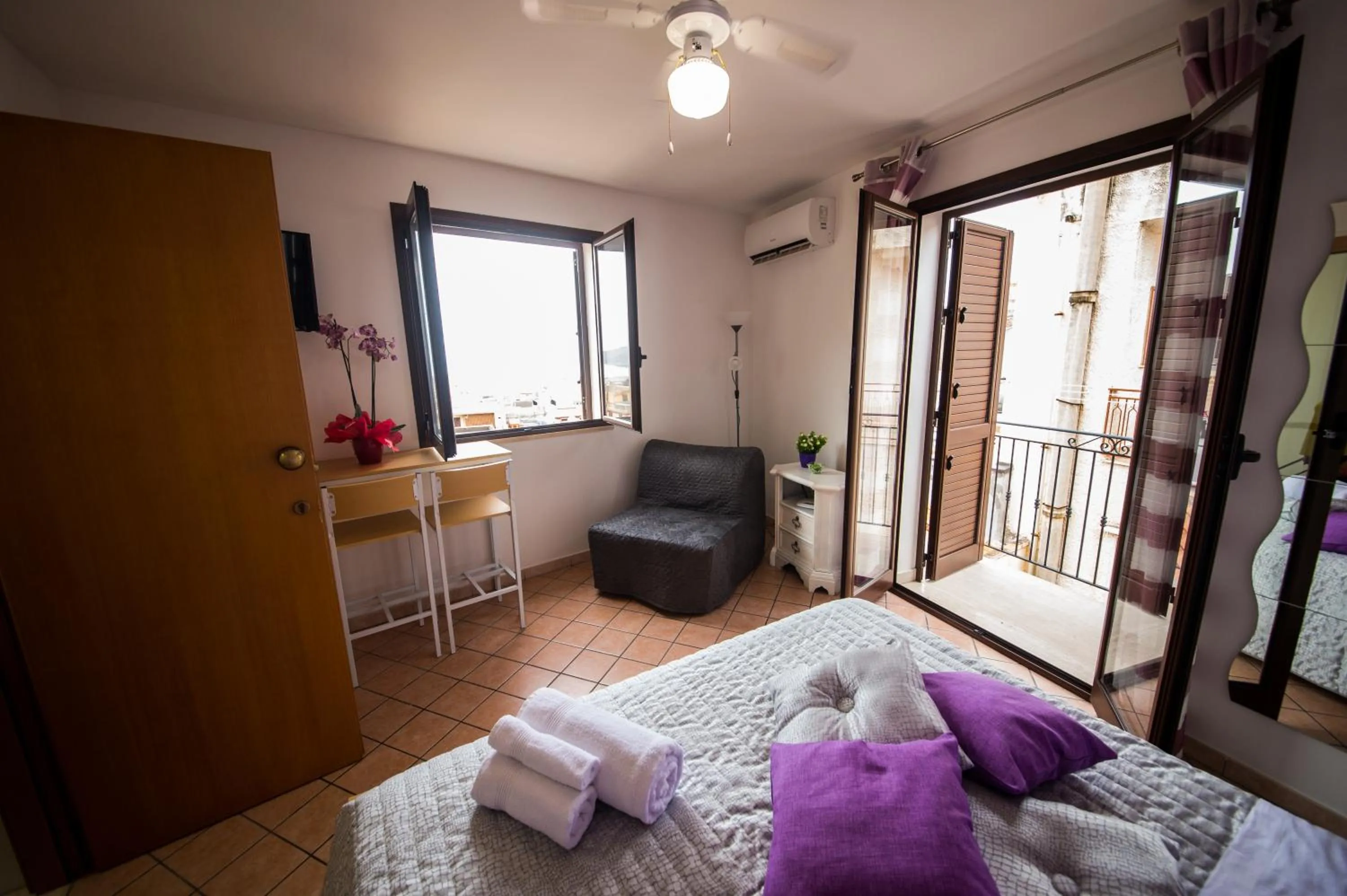 Bed in 'A Cumerdia - Casa Vacanze