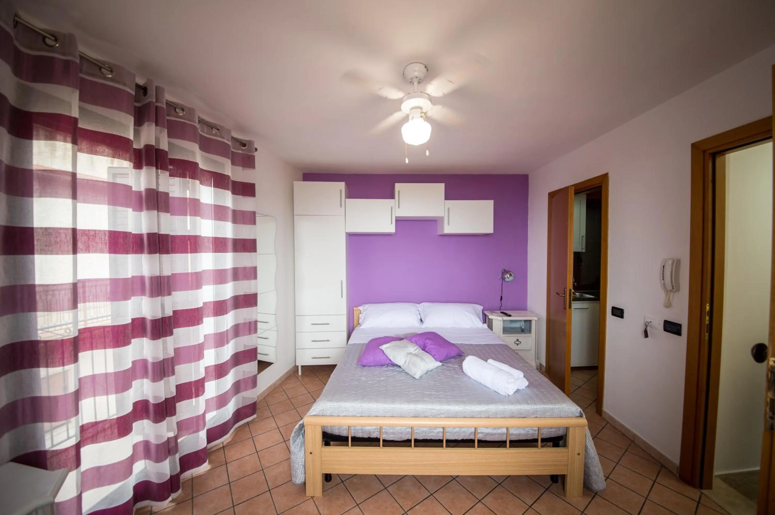 Bed in 'A Cumerdia - Casa Vacanze