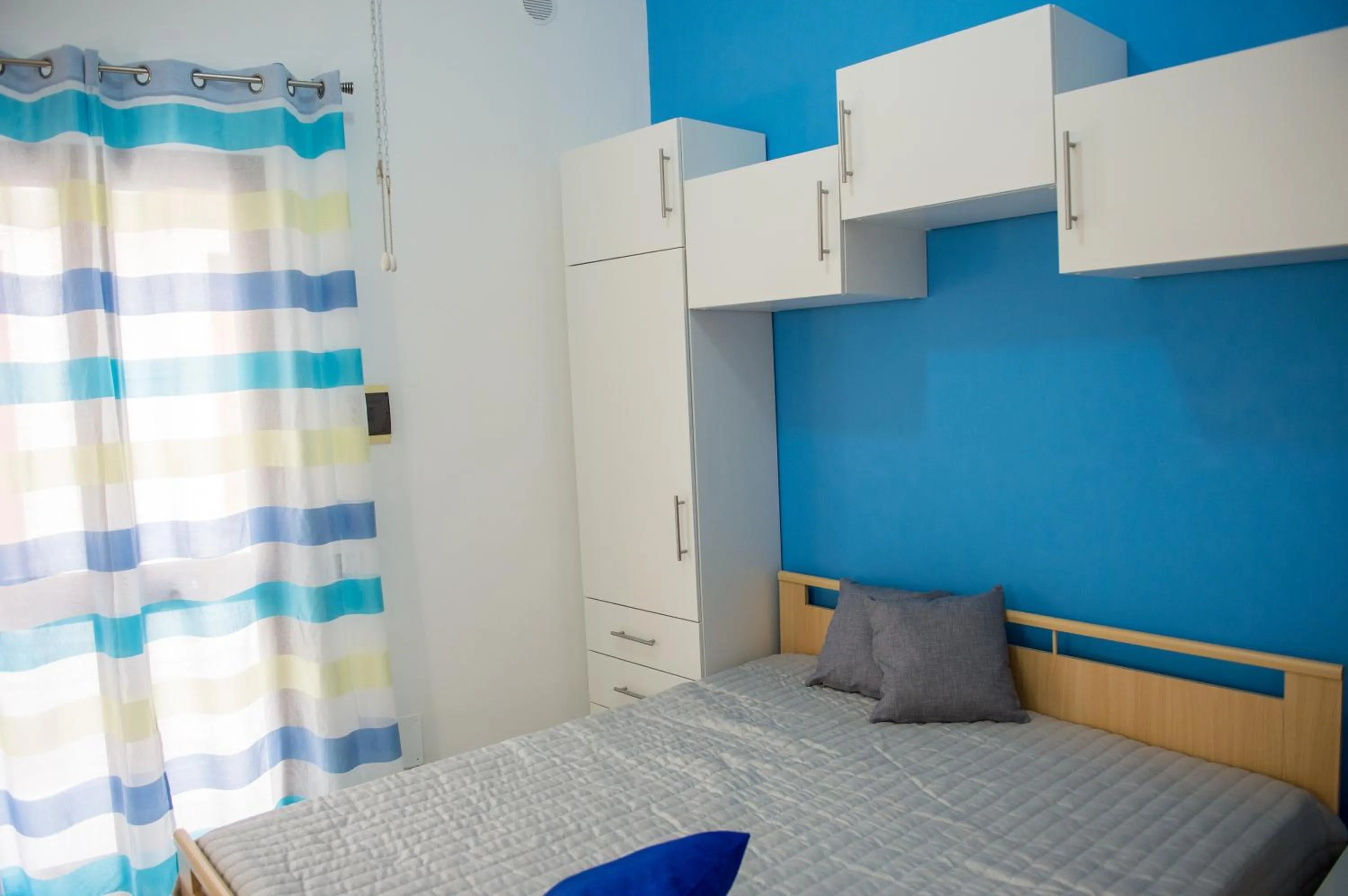 Bed in 'A Cumerdia - Casa Vacanze