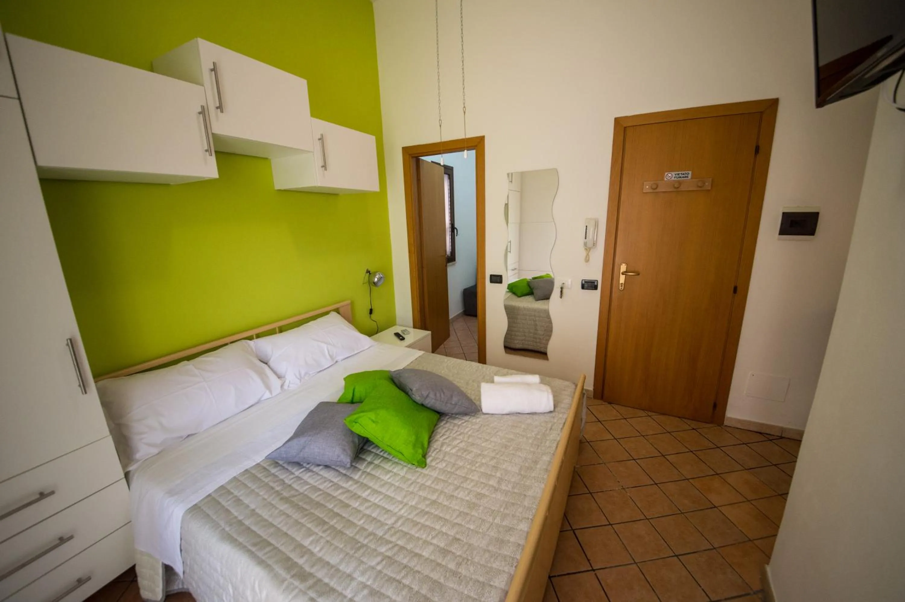 Bed in 'A Cumerdia - Casa Vacanze