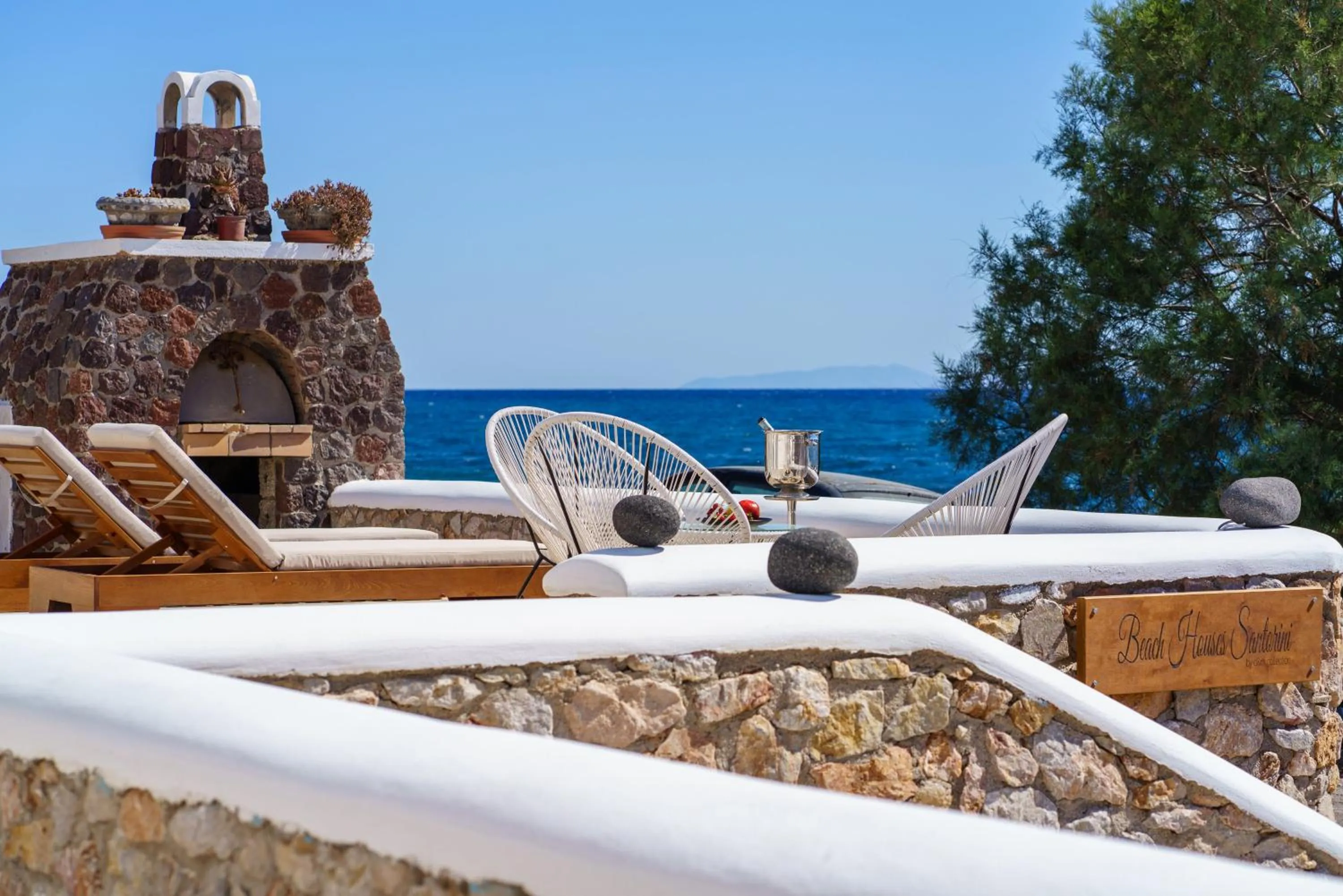 Property logo or sign in Beach Houses Santorini