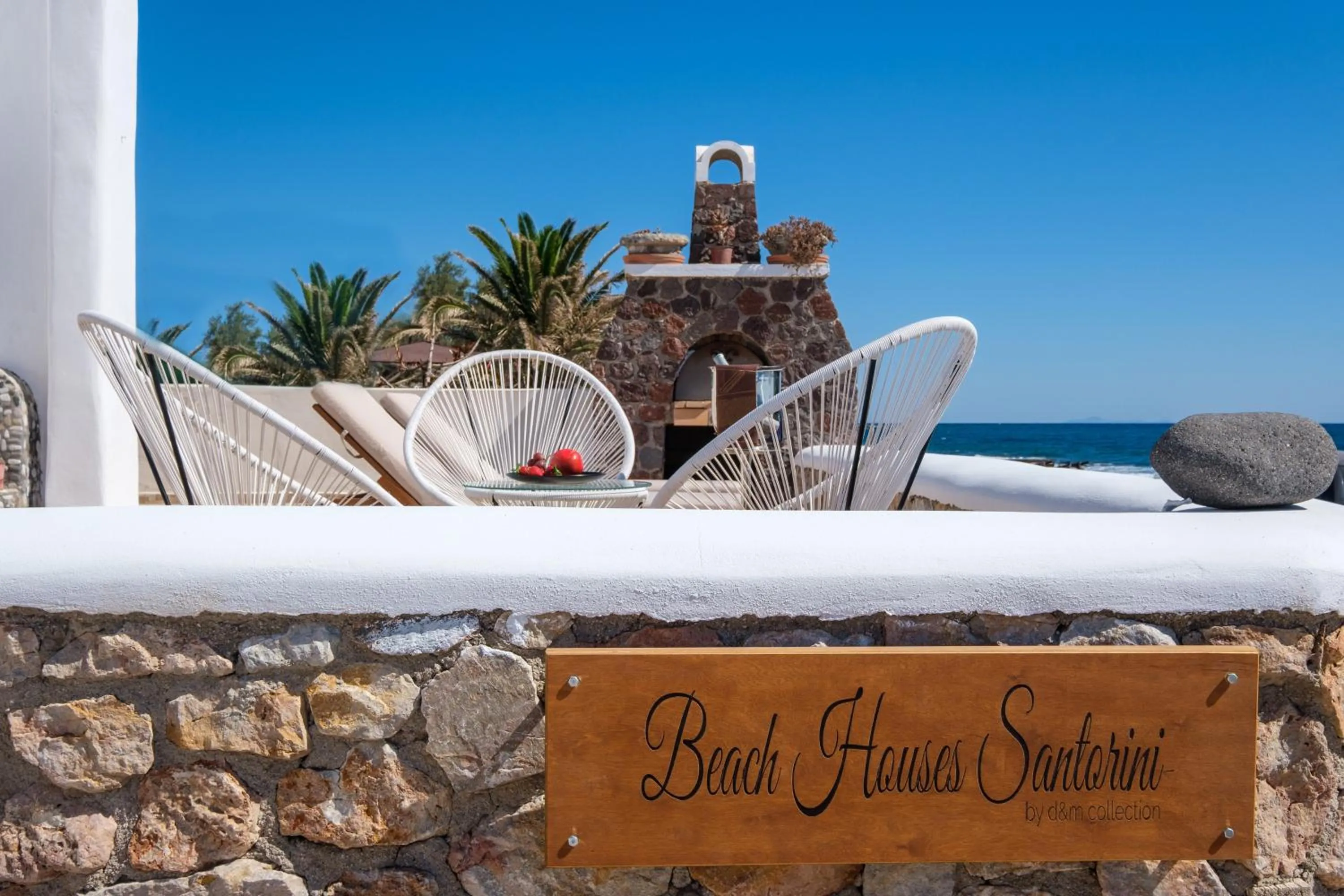 Property logo or sign in Beach Houses Santorini