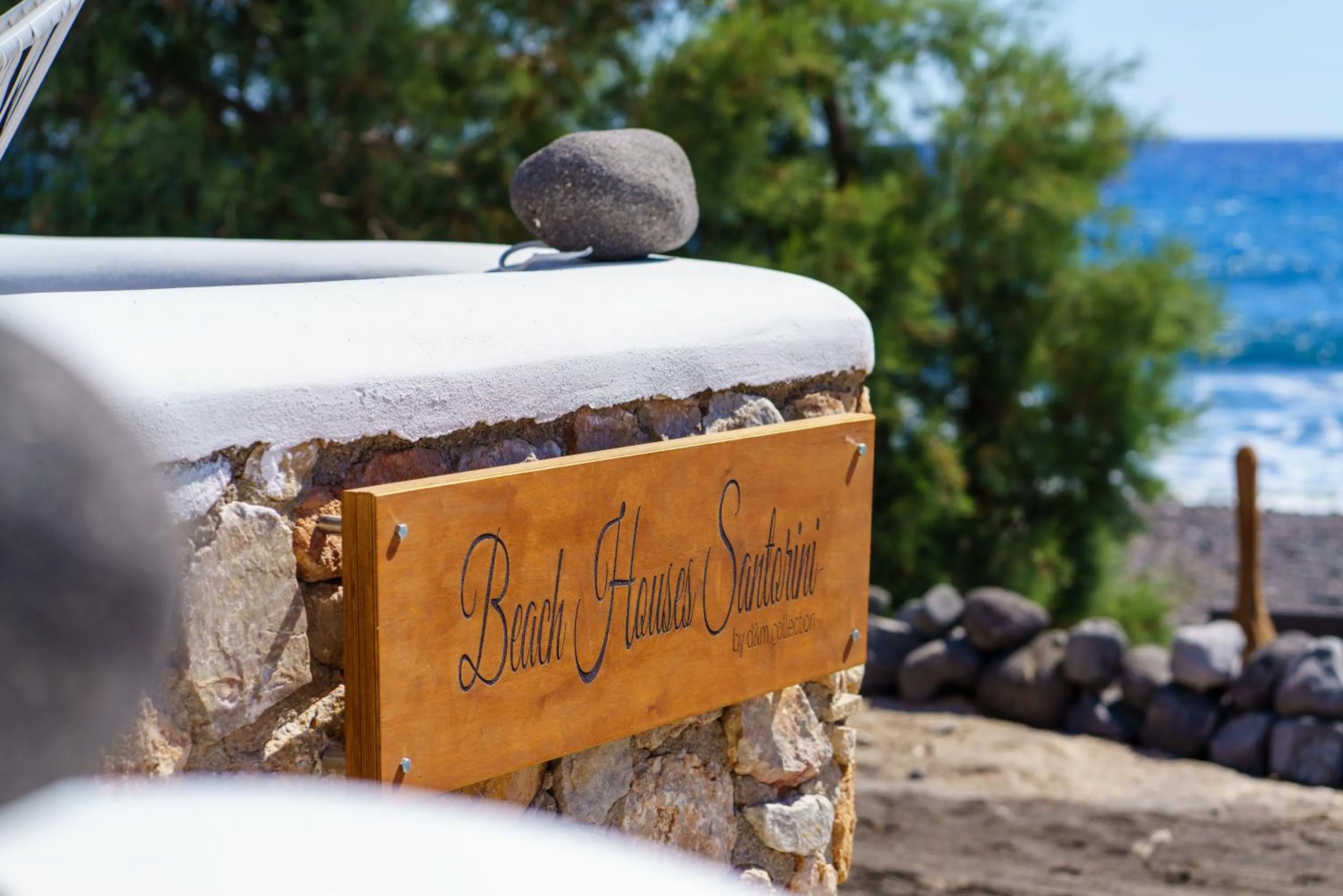 Property logo or sign in Beach Houses Santorini