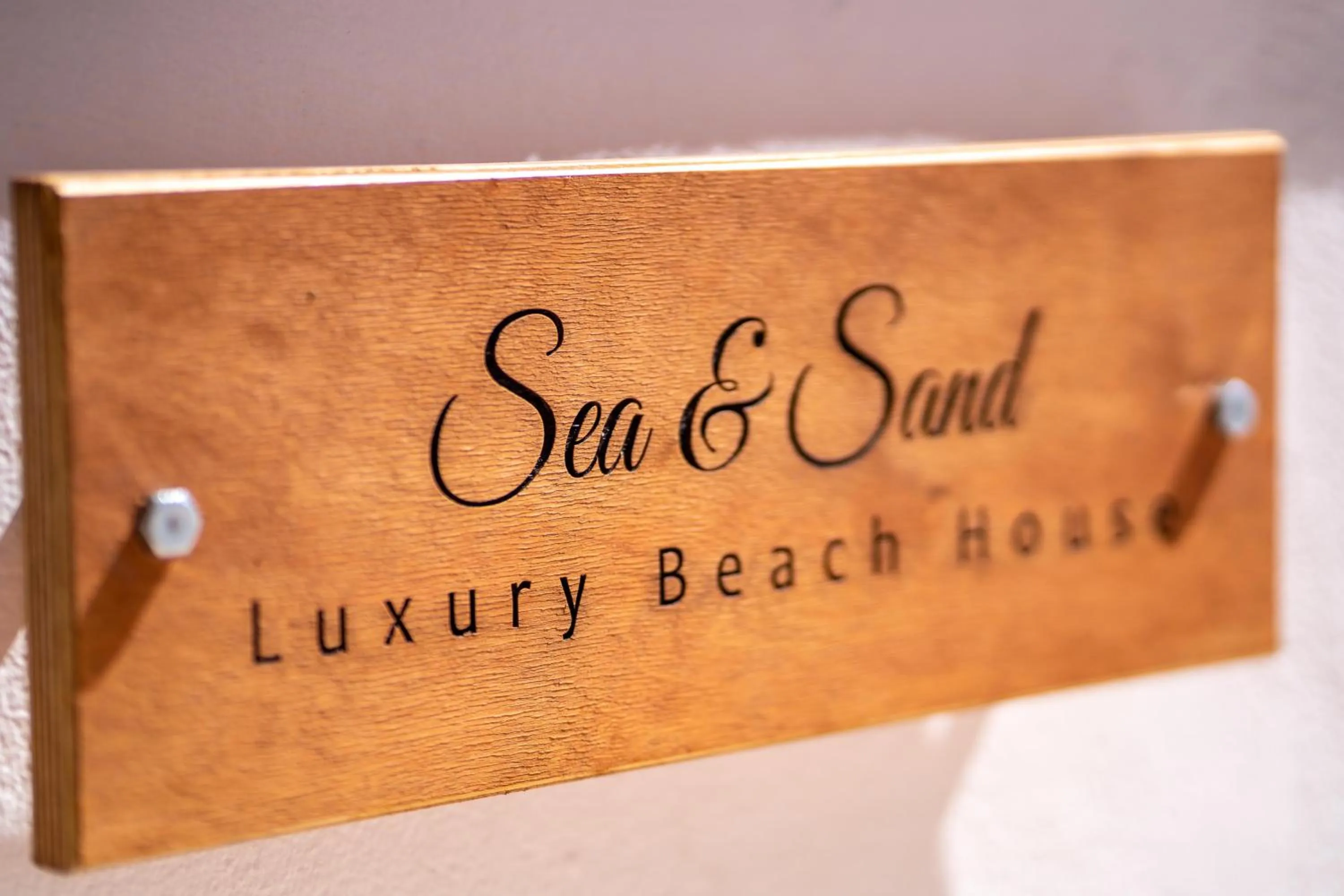 Logo/Certificate/Sign in Beach Houses Santorini