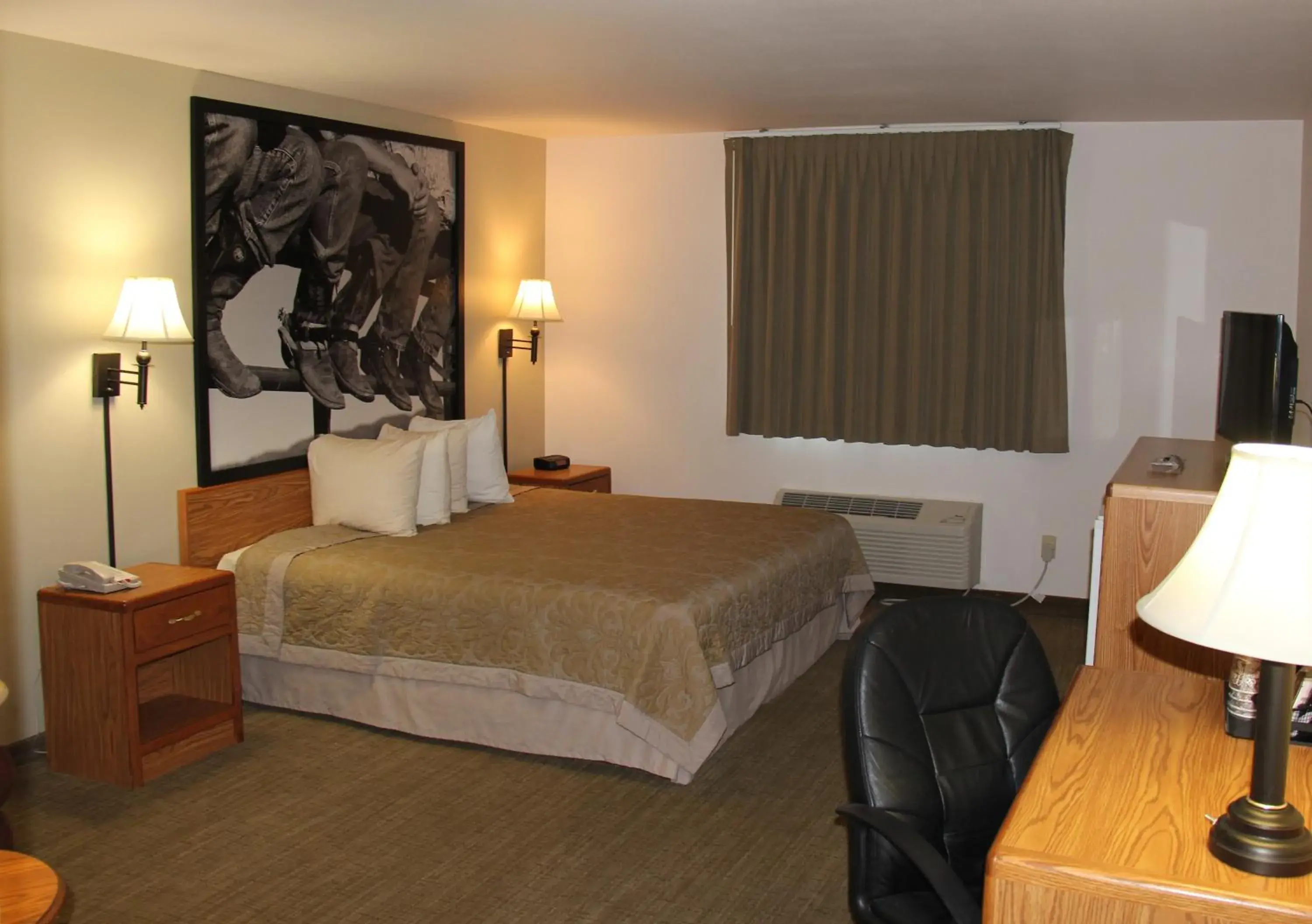 Deluxe King Room - single occupancy in Homestead Inn and Suites Deluxe King Room - single occupancy in Homestead Inn and Suites
