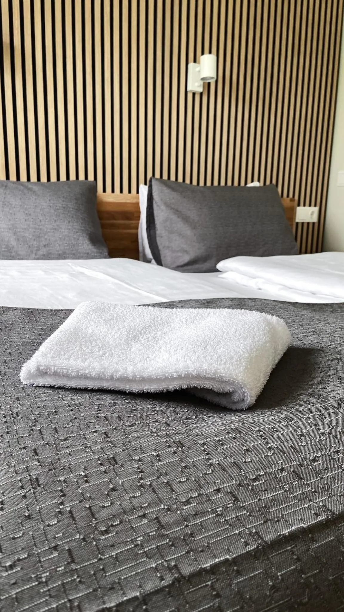 Bed in Skipalaekur Guesthouse