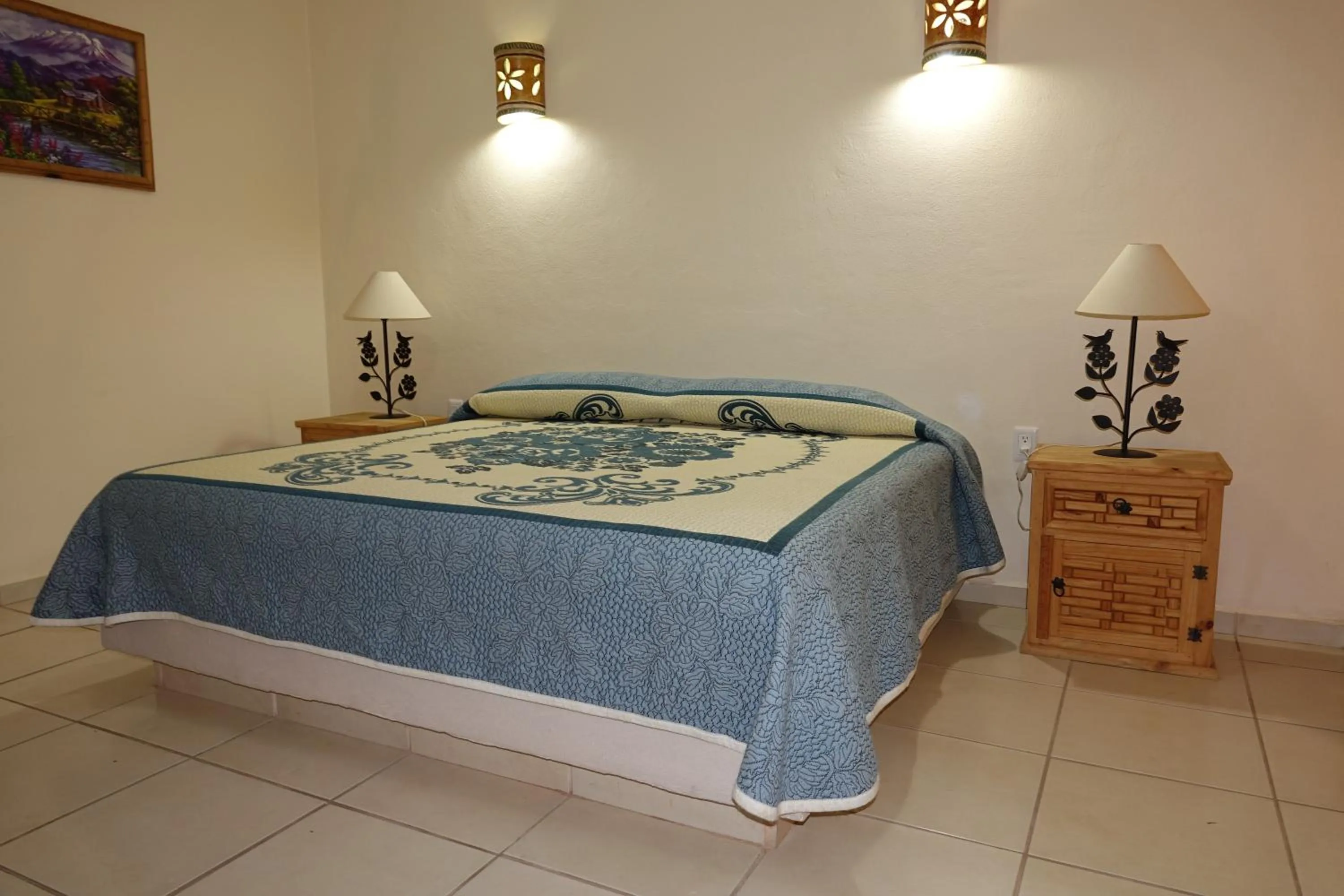 Bed in Quinta Comala Hotel & Villas