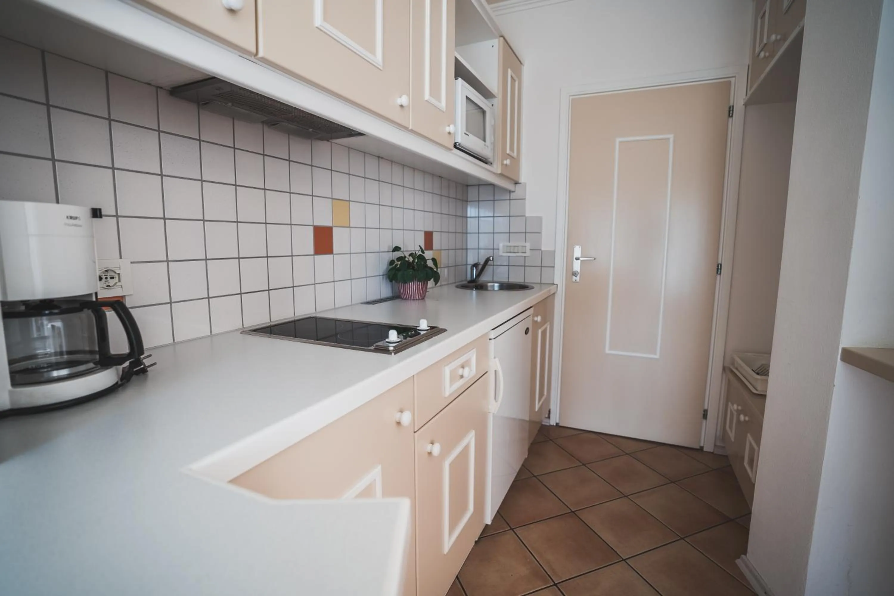 Kitchen or kitchenette in Wanda Apartments