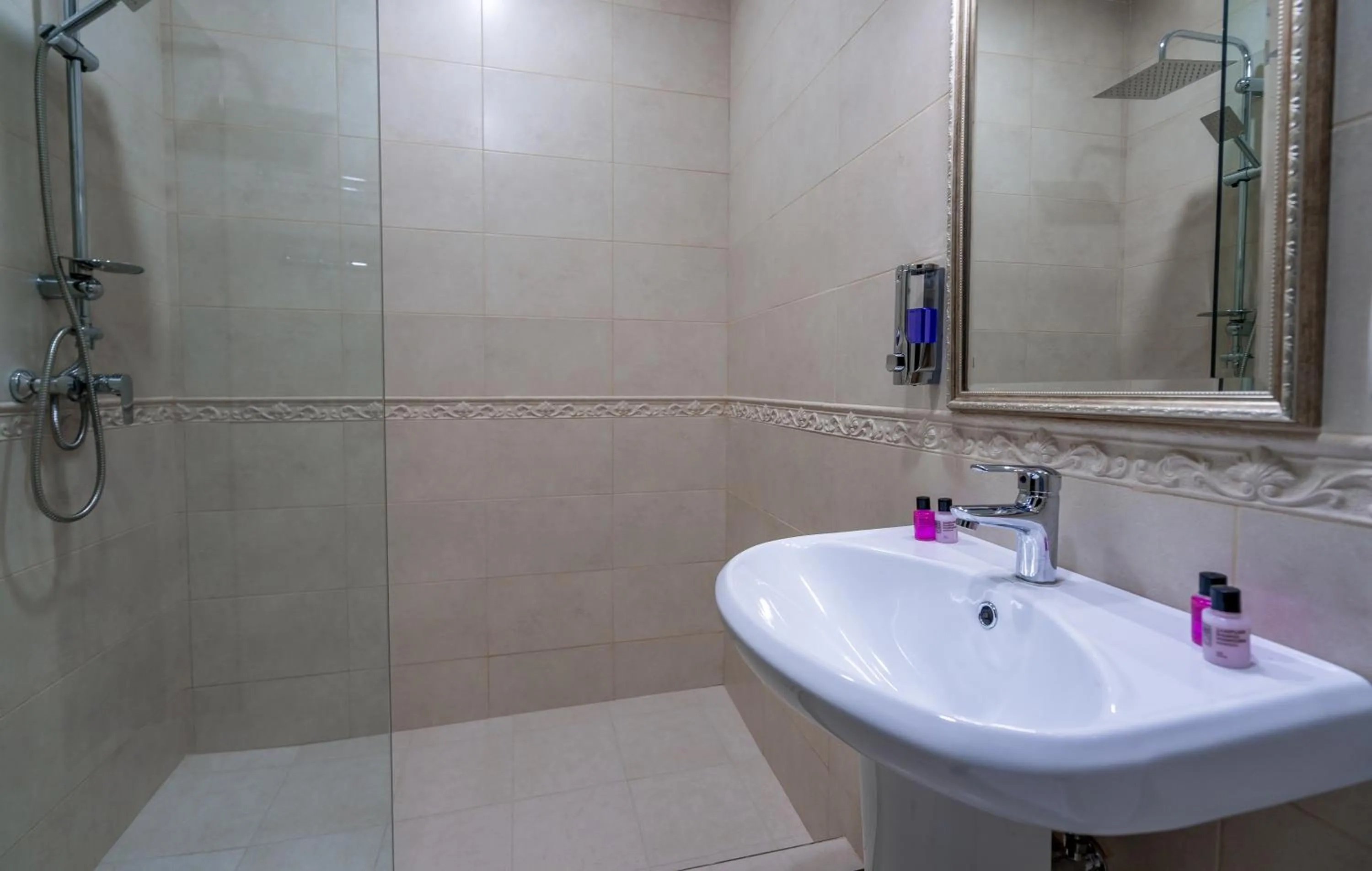 Shower in Golden Light Hotel