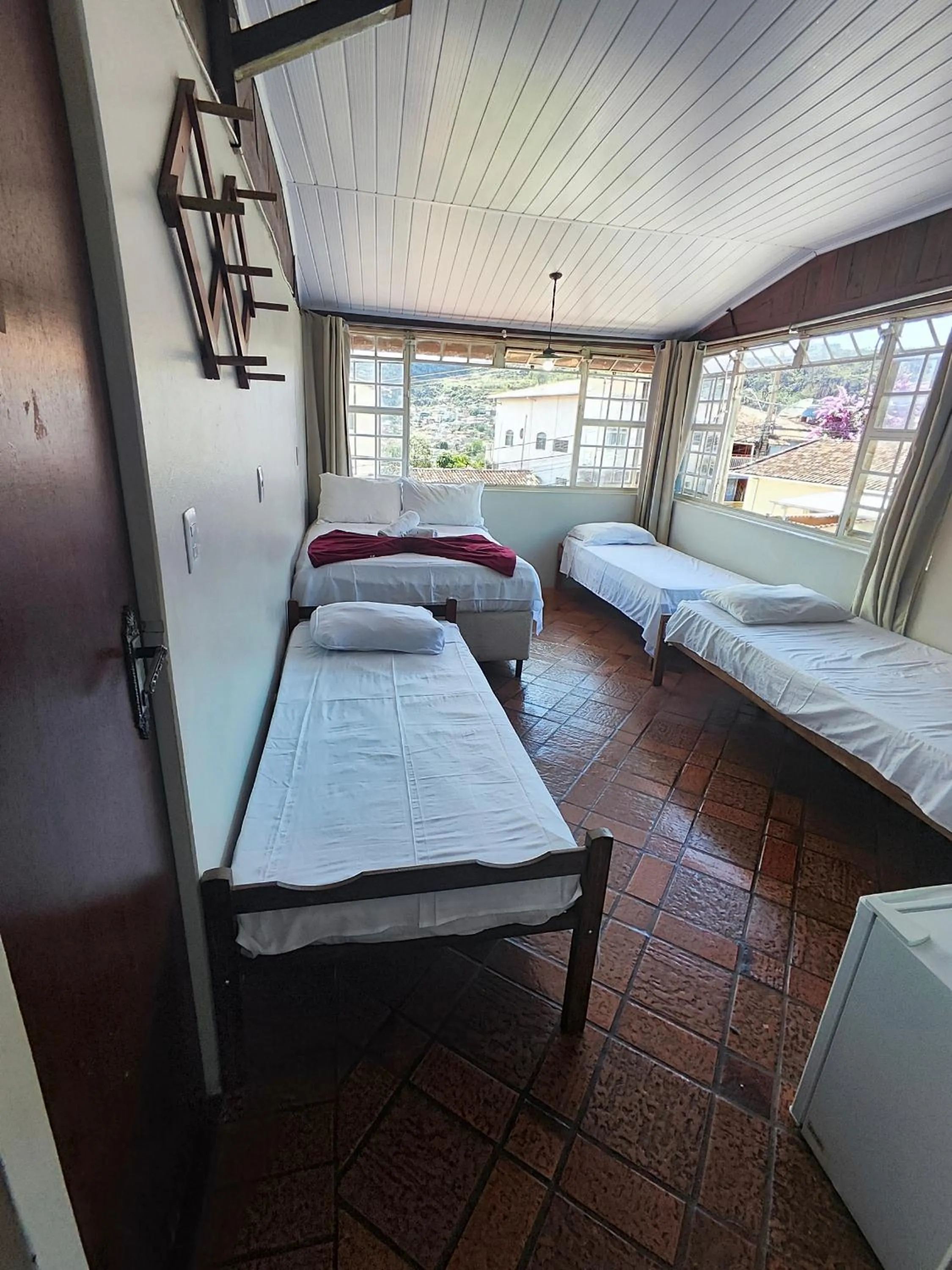 Bed in Pousada Acayaca