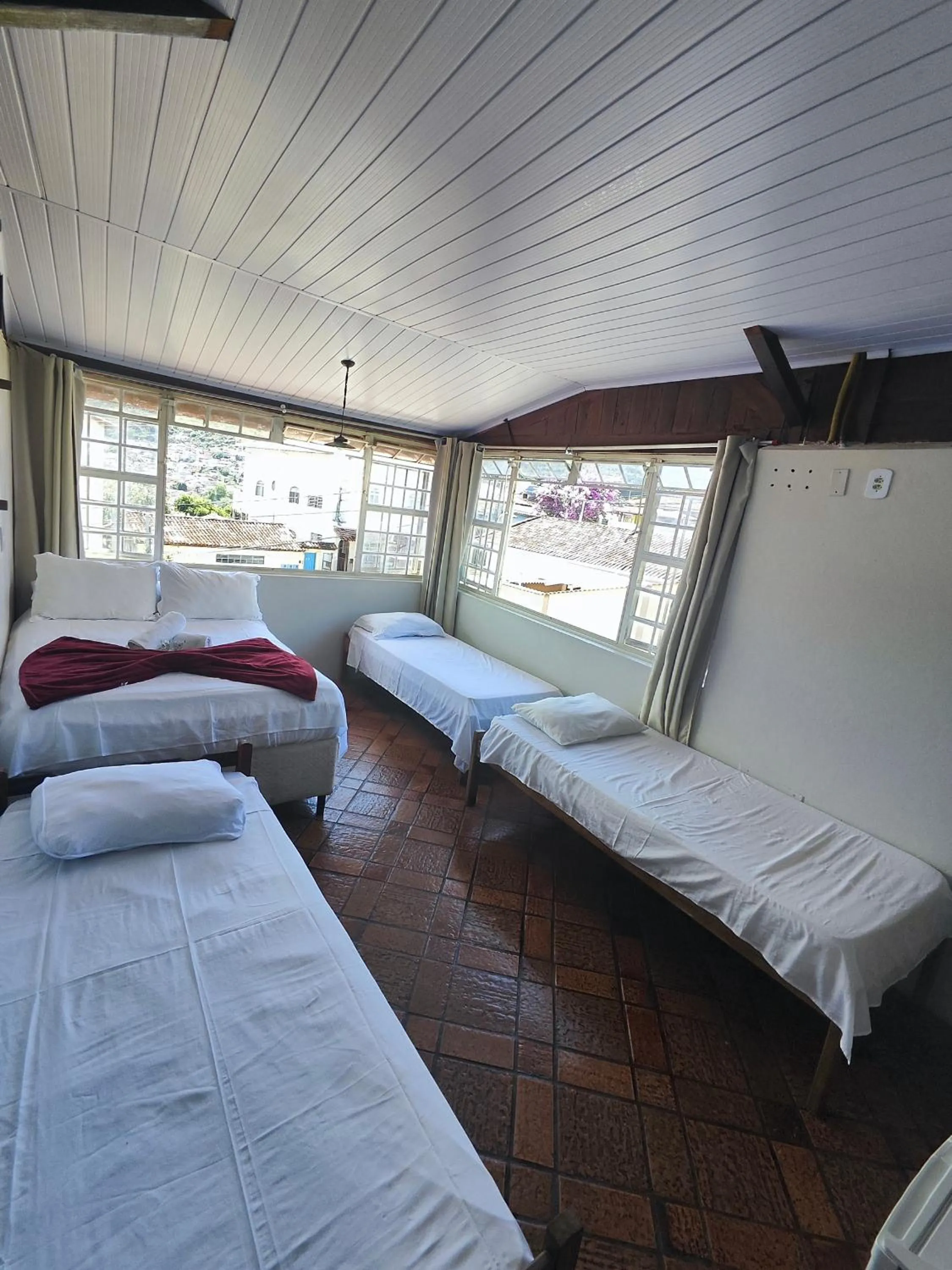 Bed in Pousada Acayaca