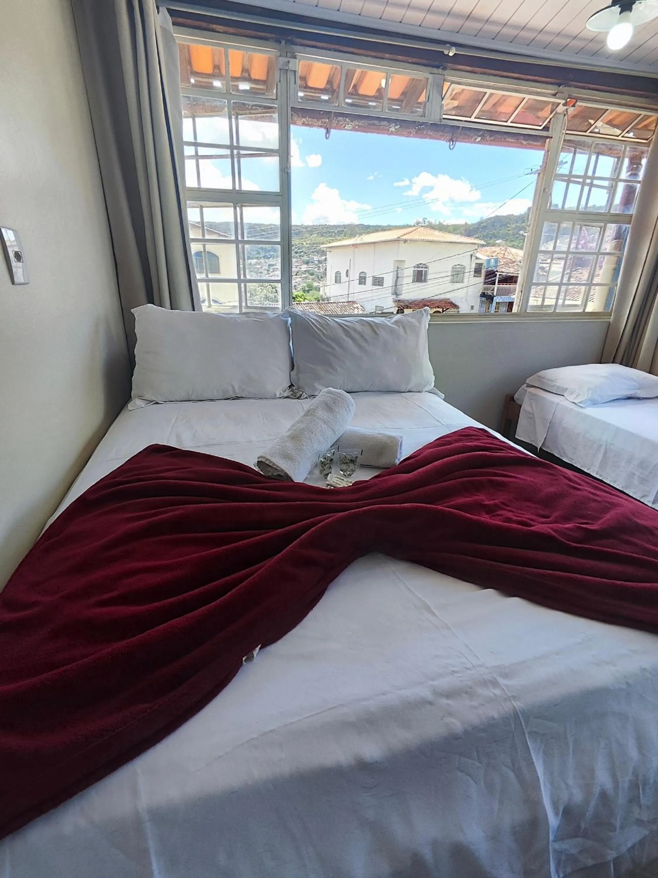 Bed in Pousada Acayaca