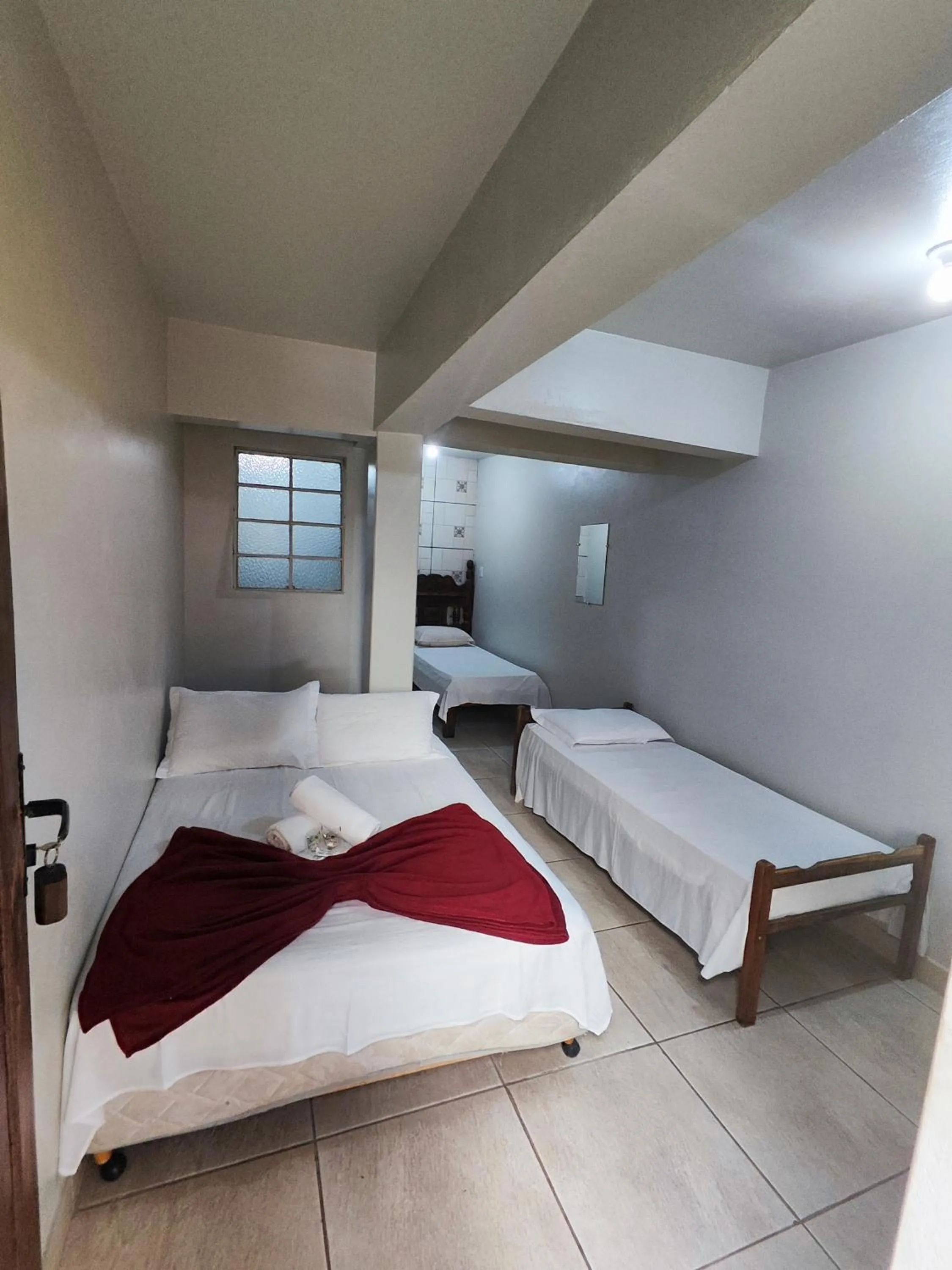 Bed in Pousada Acayaca