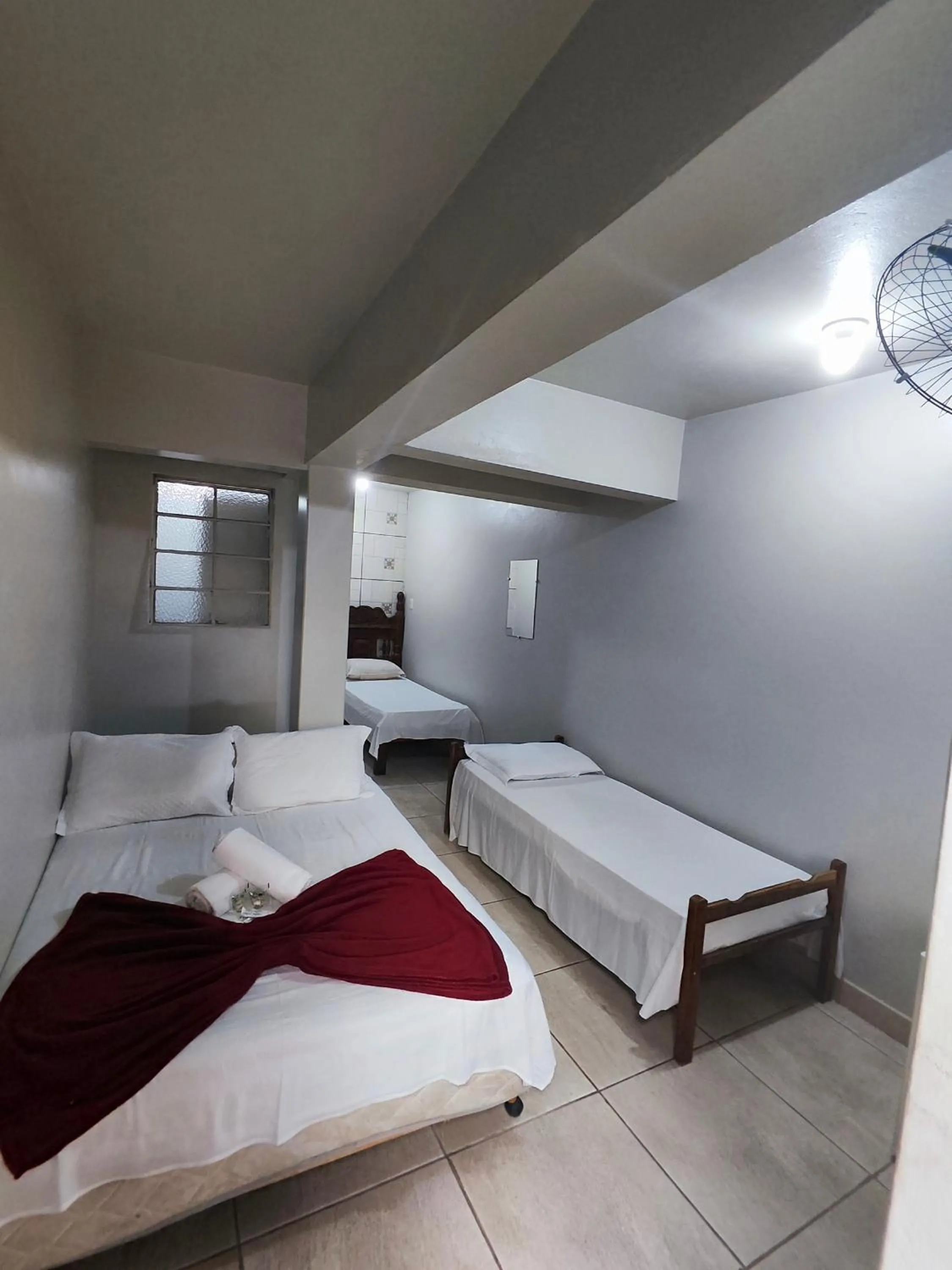 Bed in Pousada Acayaca