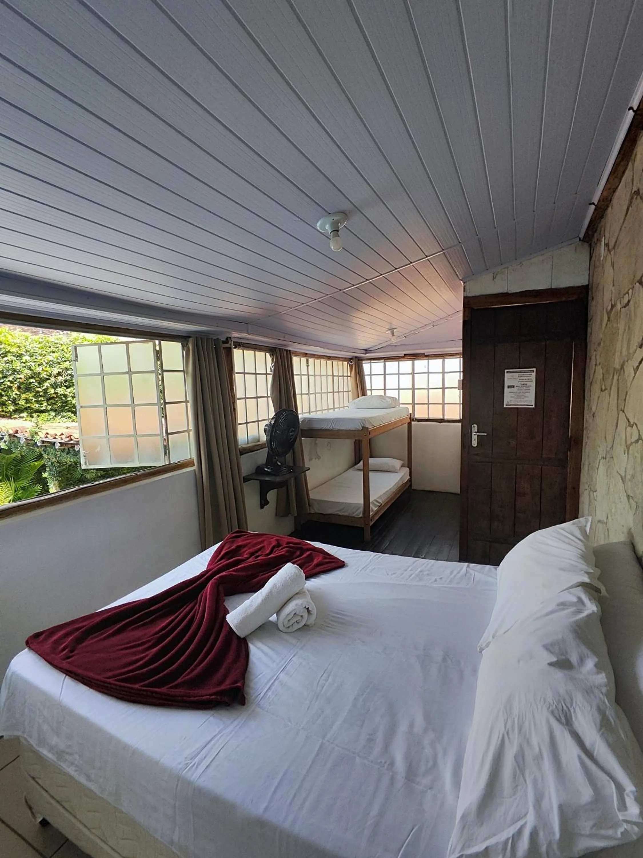 Bed in Pousada Acayaca