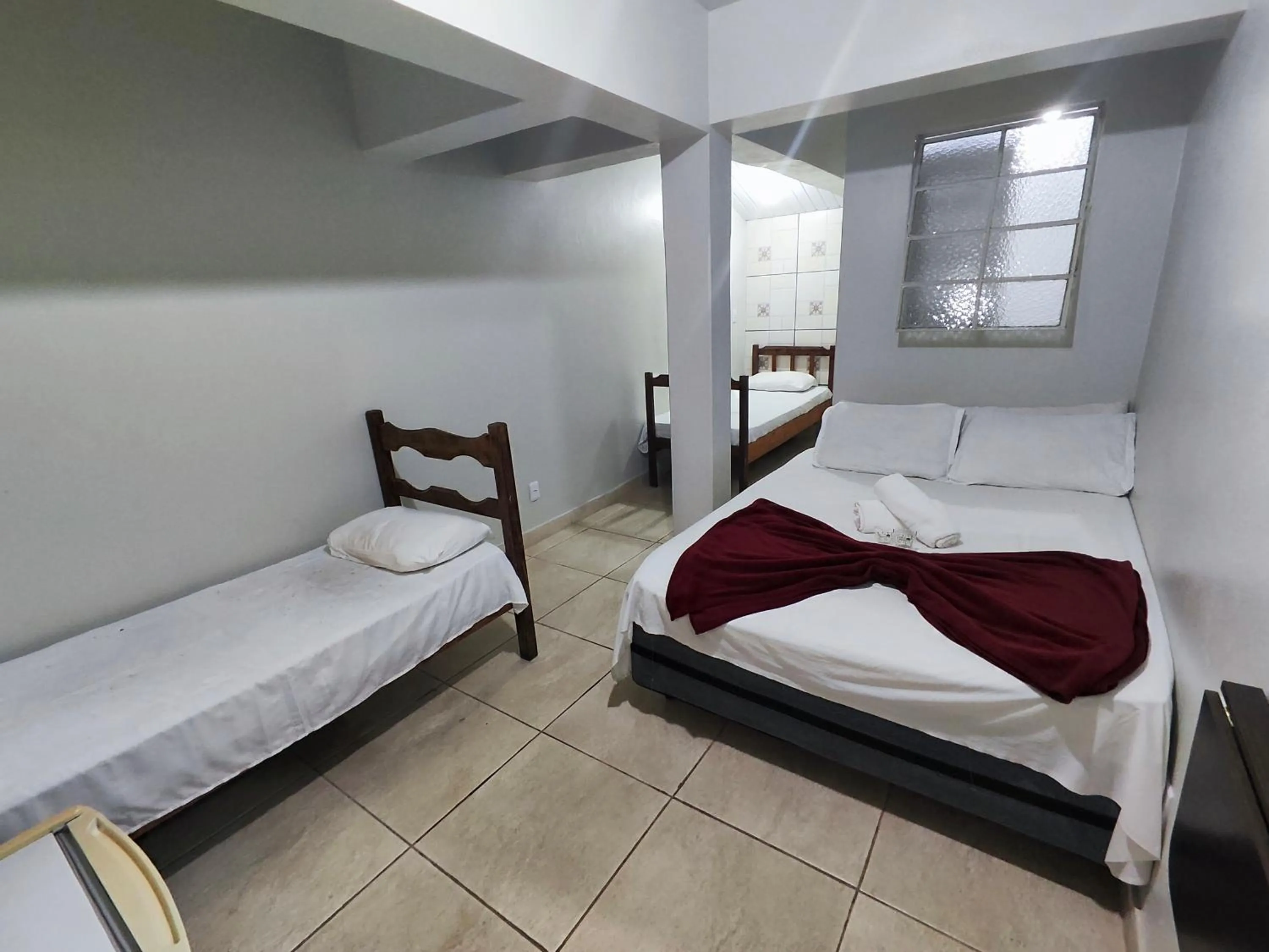 Bed in Pousada Acayaca