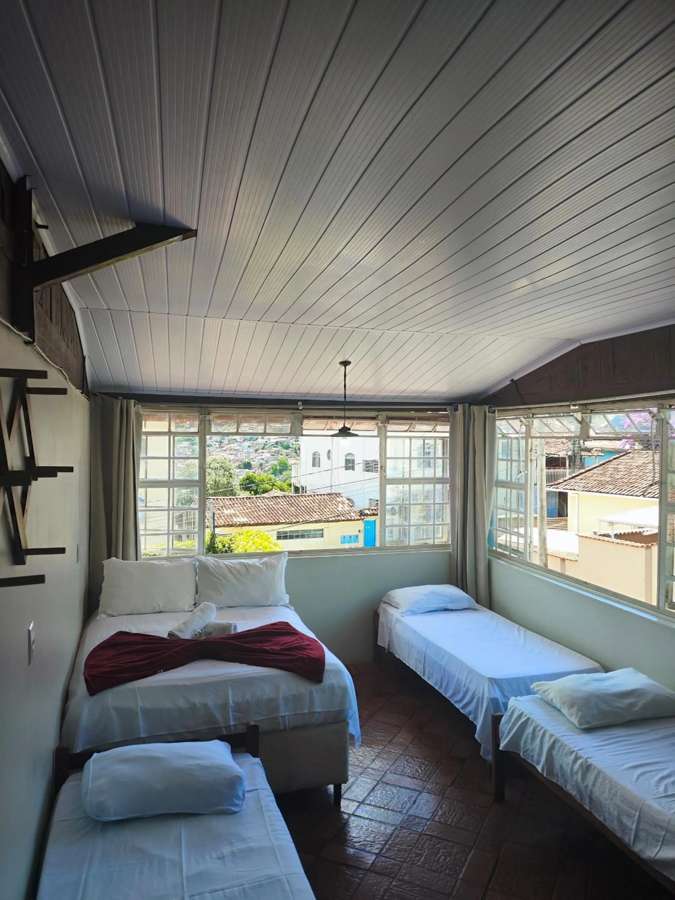 Bed in Pousada Acayaca