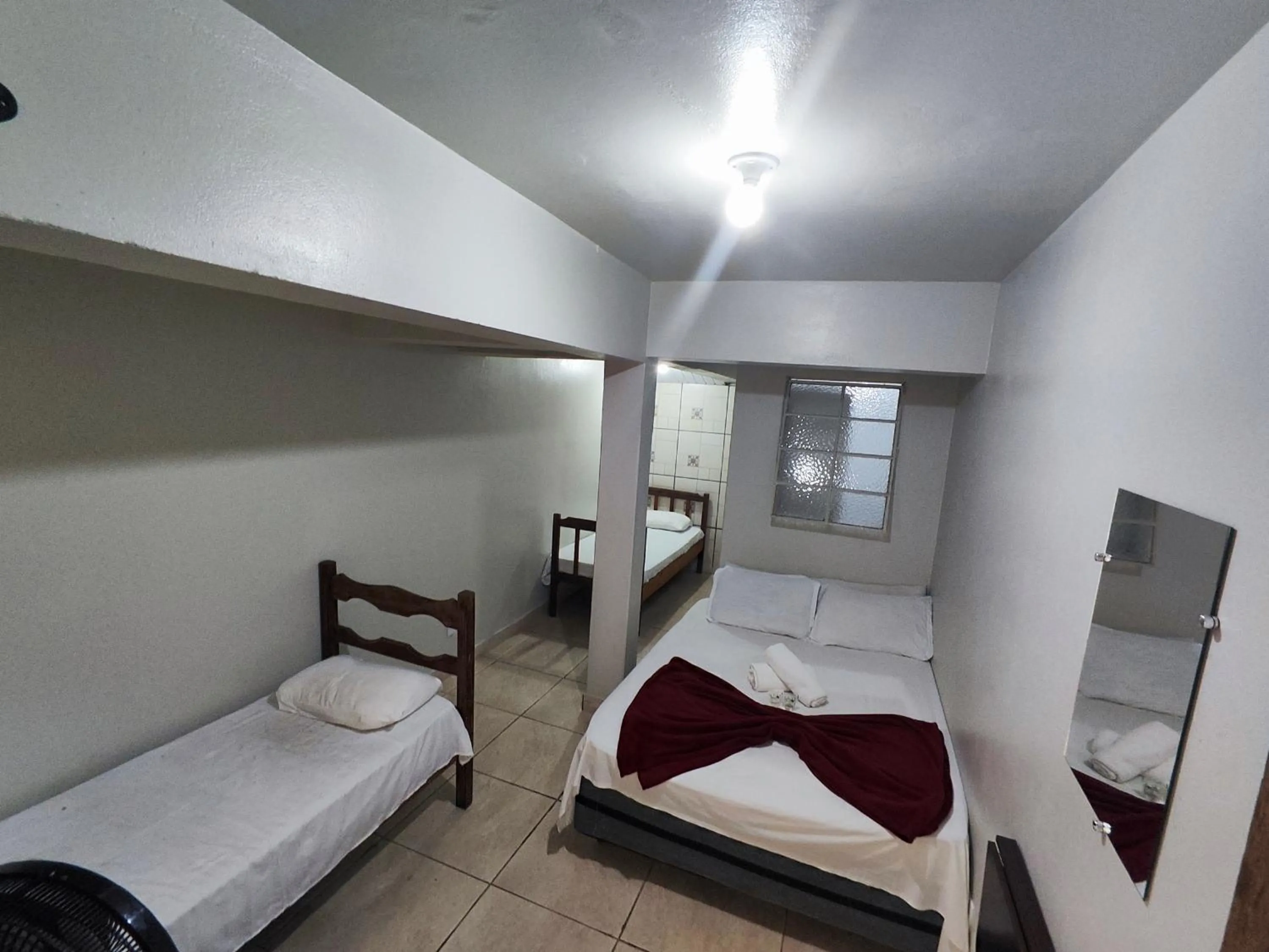 Bed in Pousada Acayaca