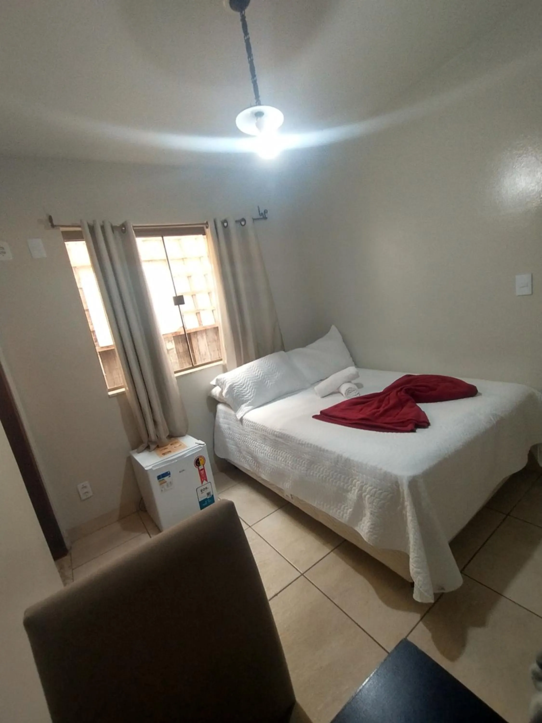 Bed in Pousada Acayaca