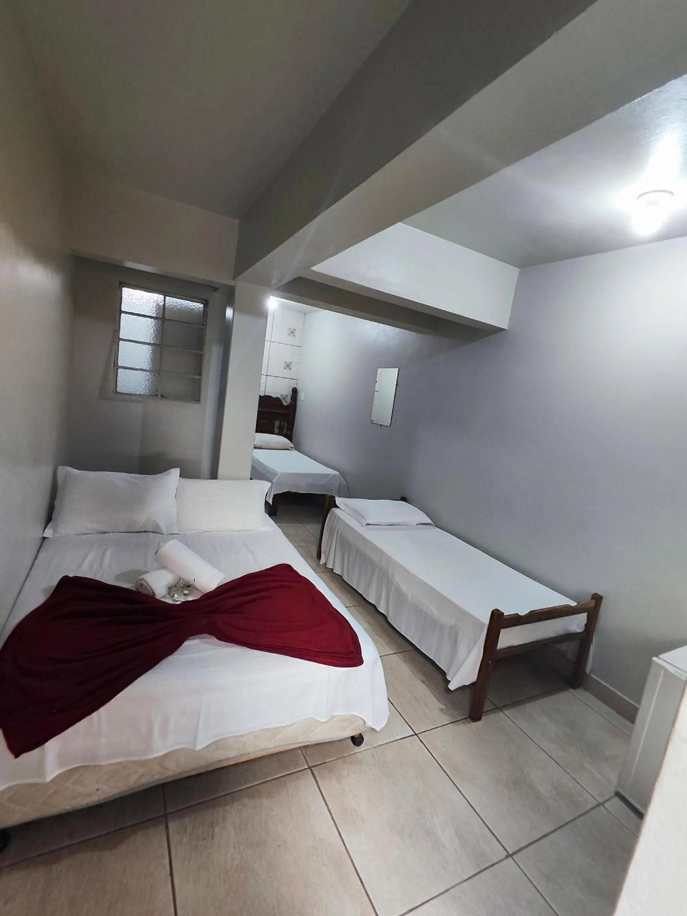 Bed in Pousada Acayaca