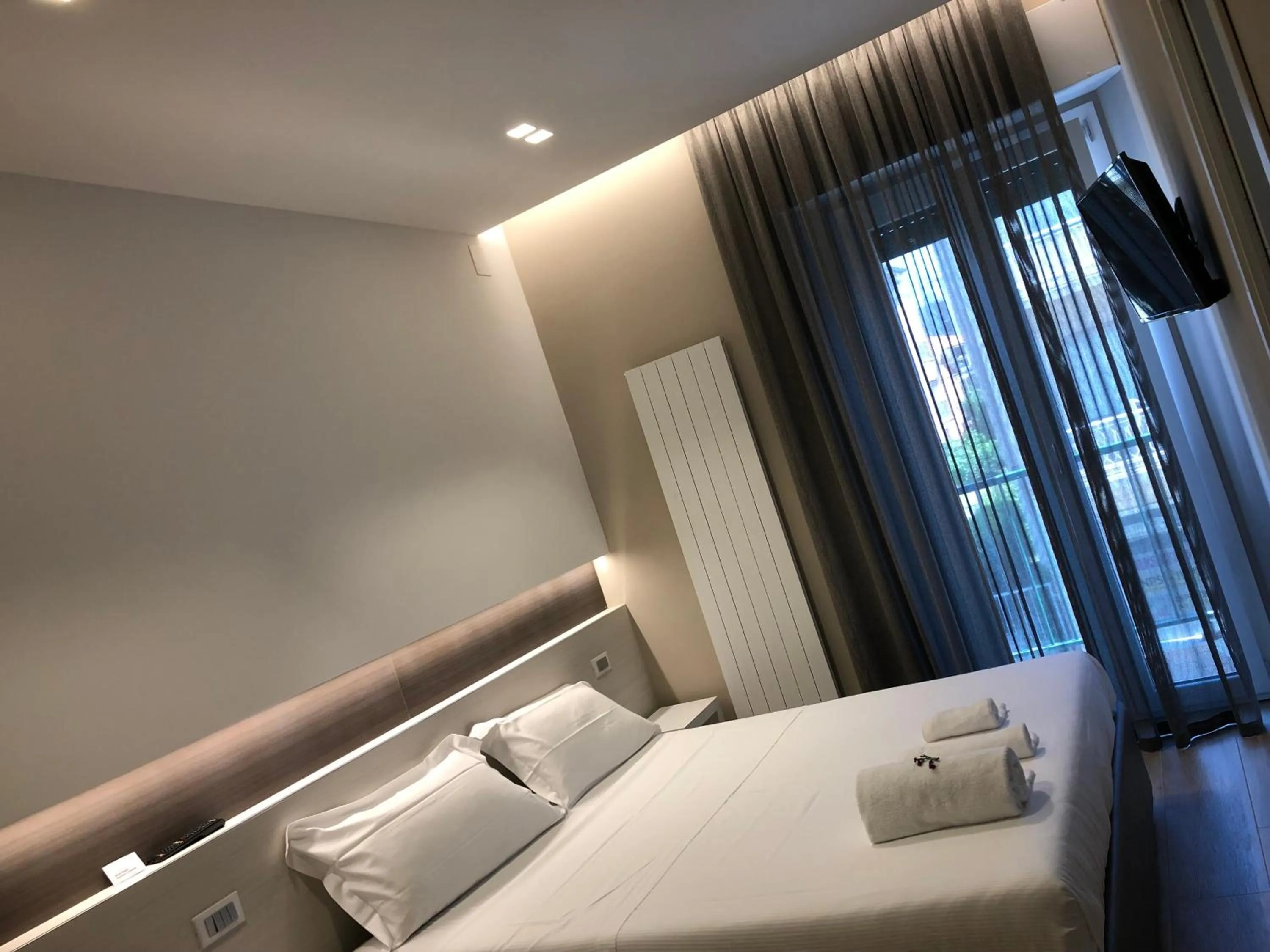 Bed in APPRODO RESiDENCE